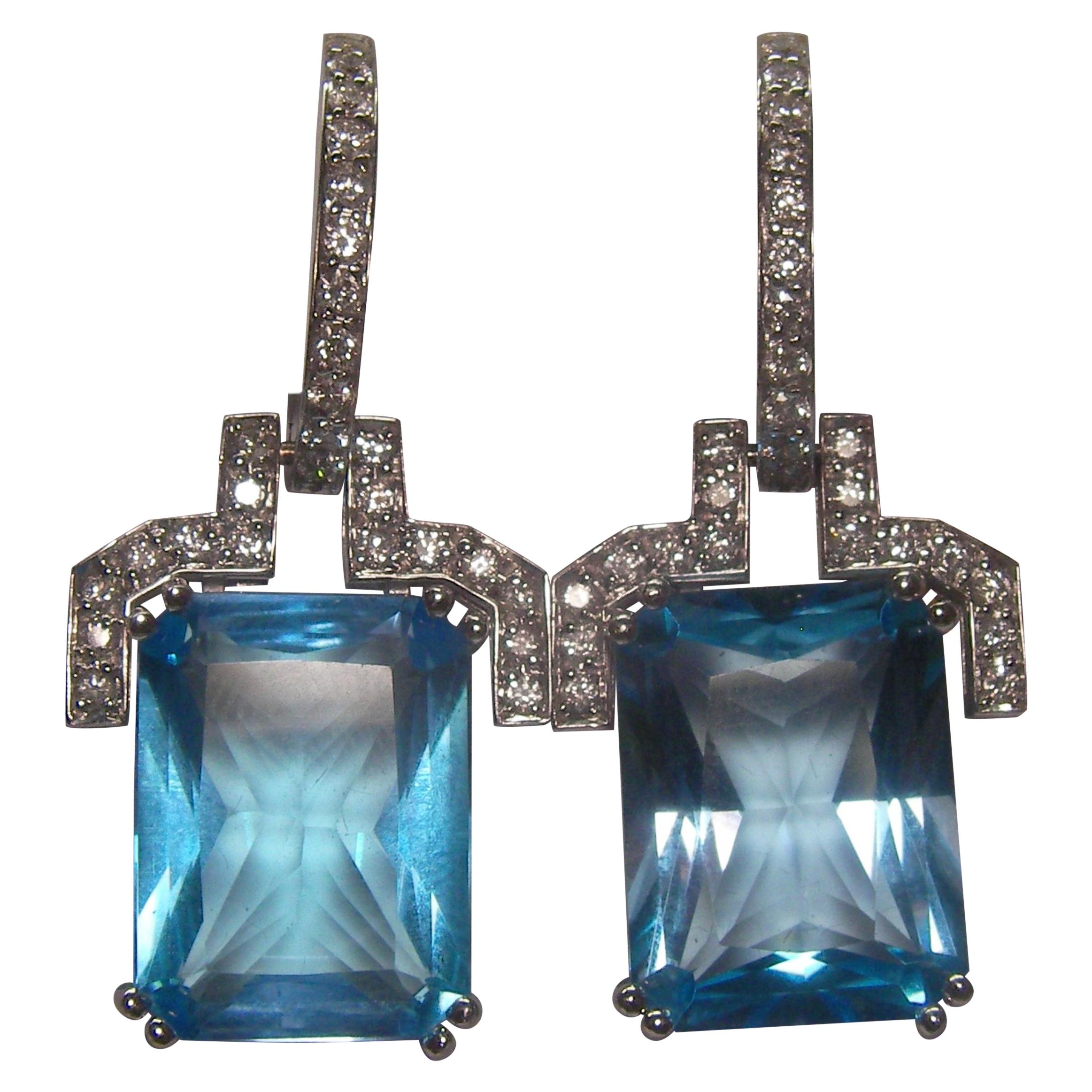 18 Karat White Gold Diamond and Blue Topaz Dangle Earrings