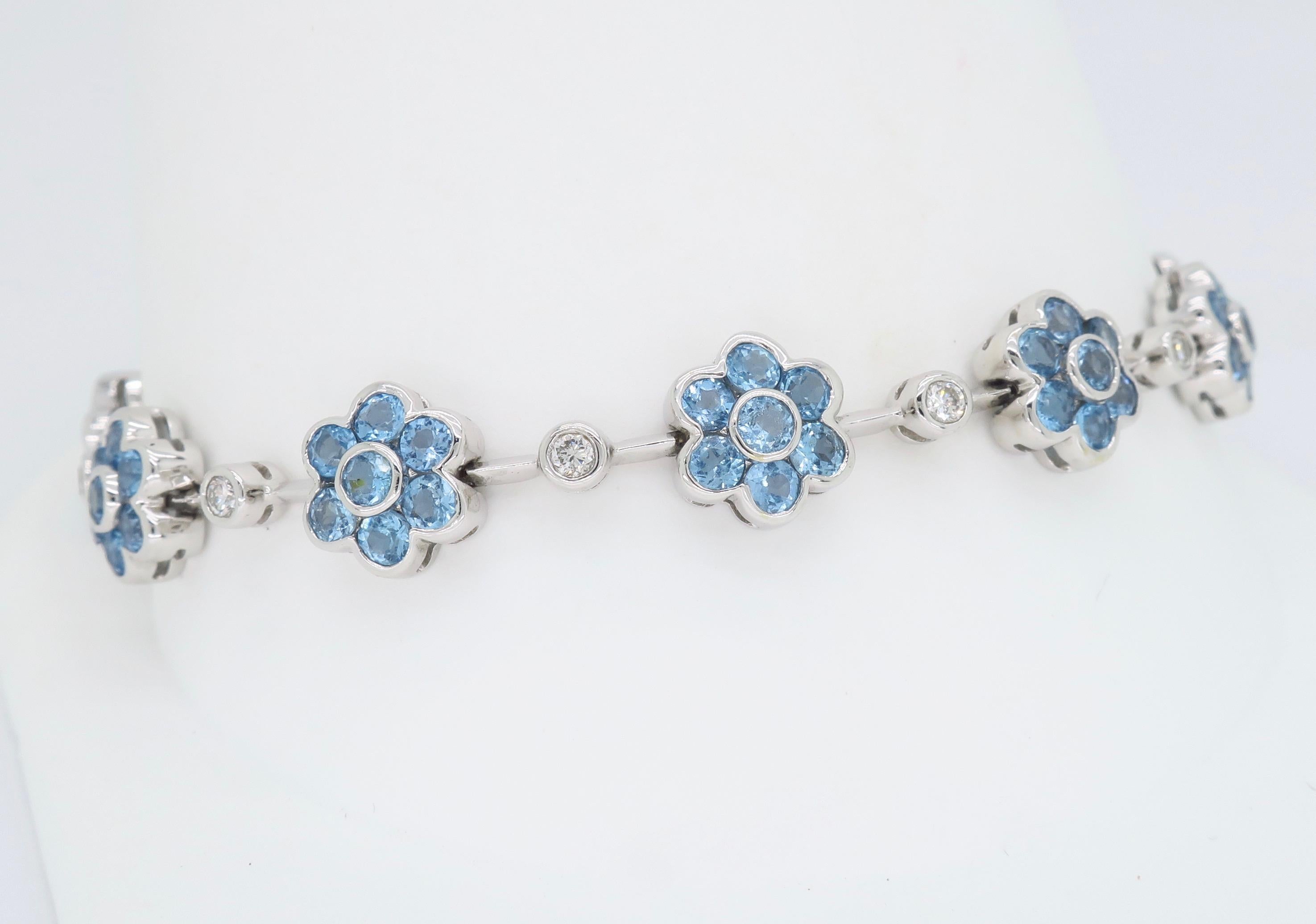 18 Karat White Gold Diamond and Blue Topaz Flower Bracelet In New Condition In Webster, NY