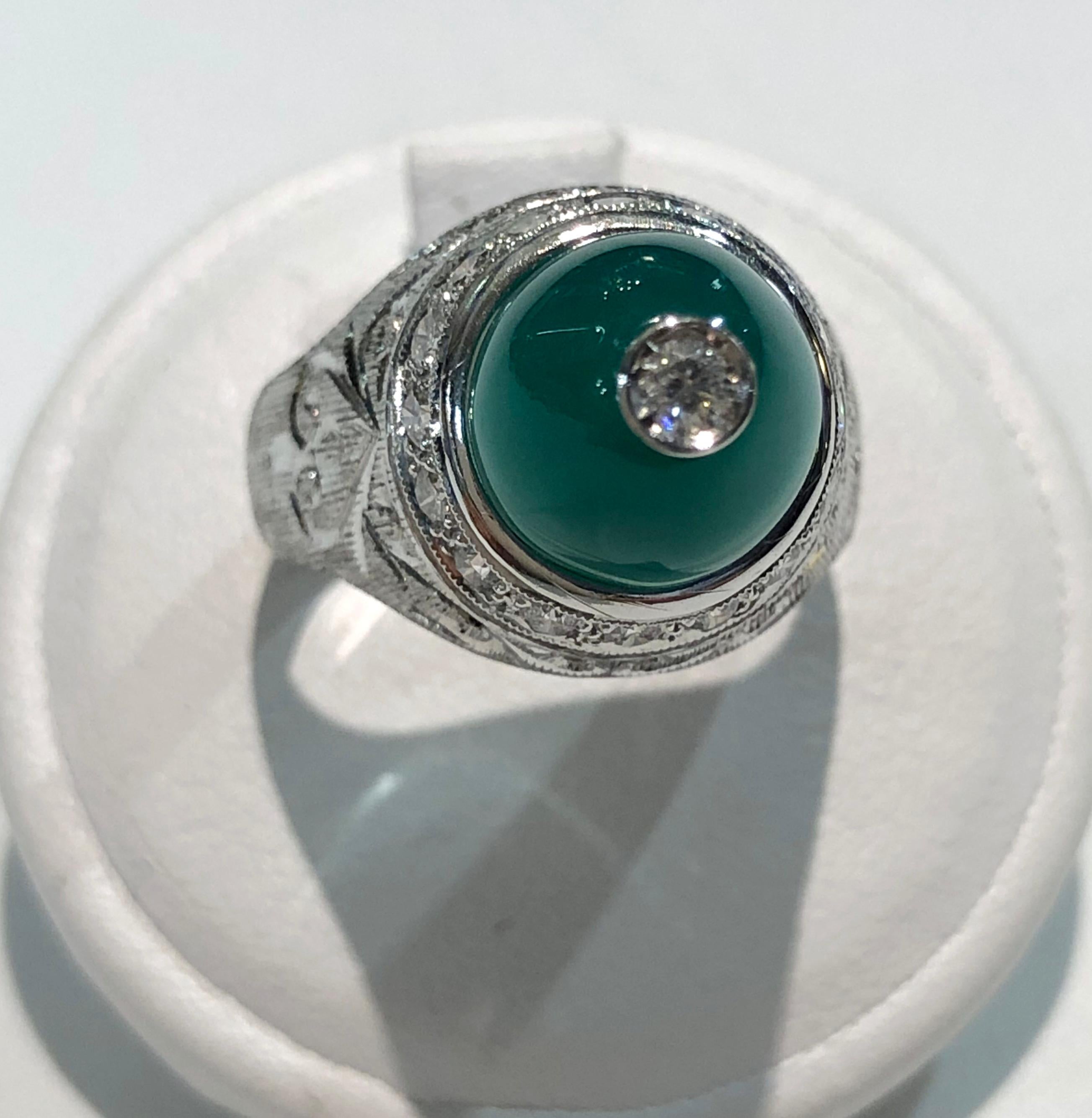 Vintage ring with 18 karat white gold band, one large Chrysoprase stone and brilliant diamonds for a total of 0.48 karats, Italy 1960s
Ring size US 7
