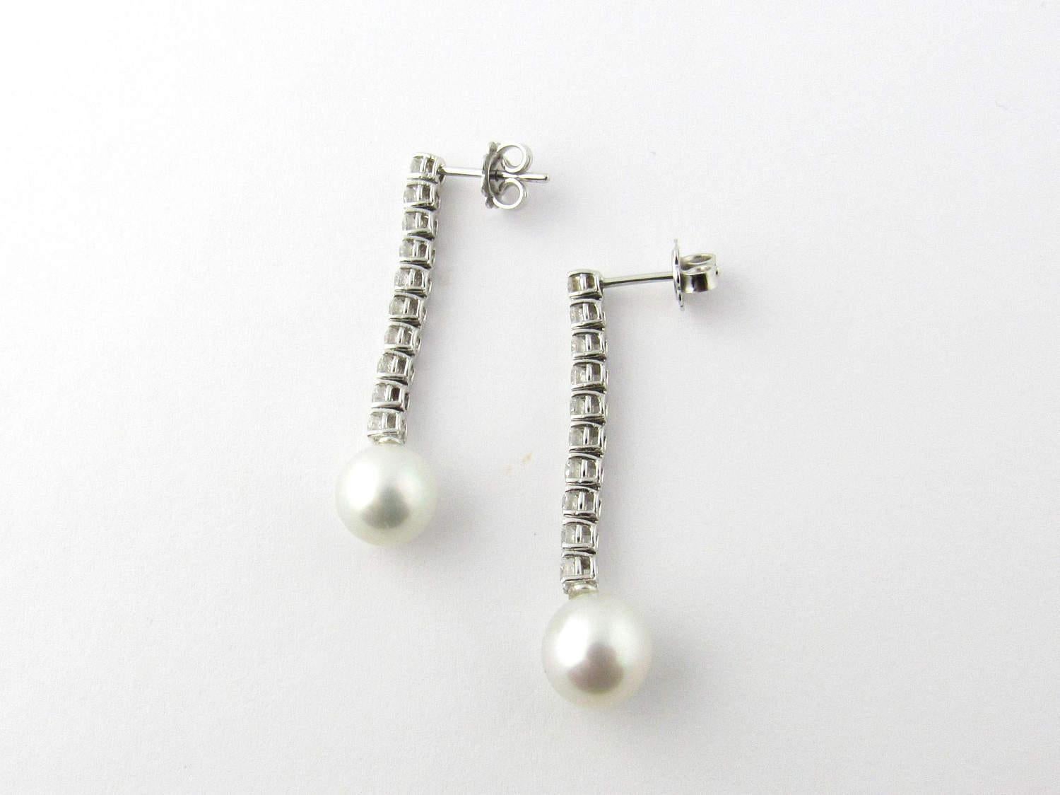 Vintage White Gold Diamond and Cultured Pearl Drop Earrings 

These beautiful and stunning diamond and pearl earrings are most extraordinary. 

The most perfect gift for a bride and her upcoming winter wonderland wedding or for that unique Christmas