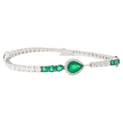 18 Karat white gold diamond and emerald bracelet