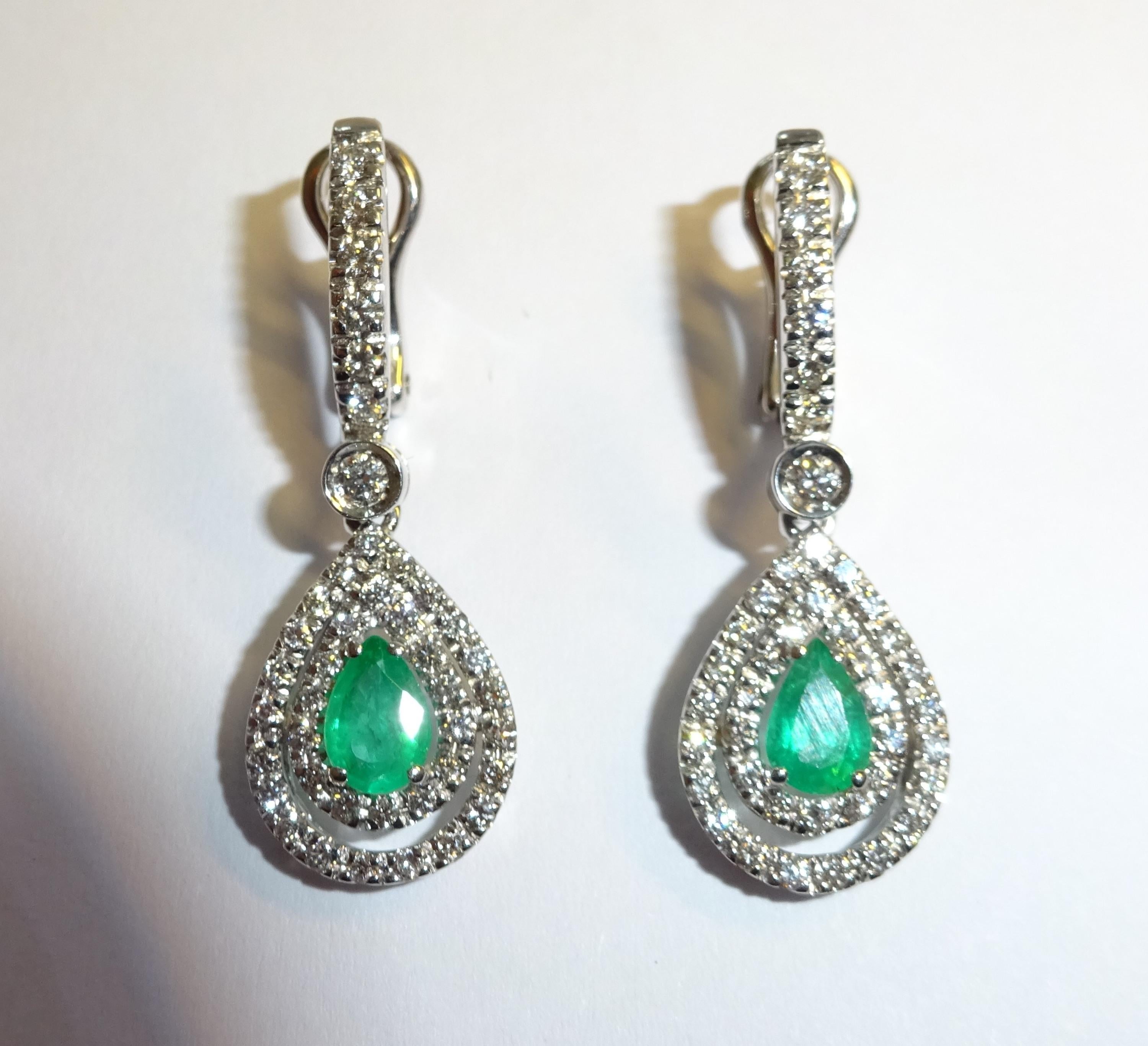 18 Karat White Gold Diamond and Emerald Dangle Earrings

84 Diamonds 0,75 Carat H SI
2 Emerald 0.73 Carat


Founded in 1974, Gianni Lazzaro is a family-owned jewelry company based out of Düsseldorf, Germany.
Although rooted in Germany, Gianni