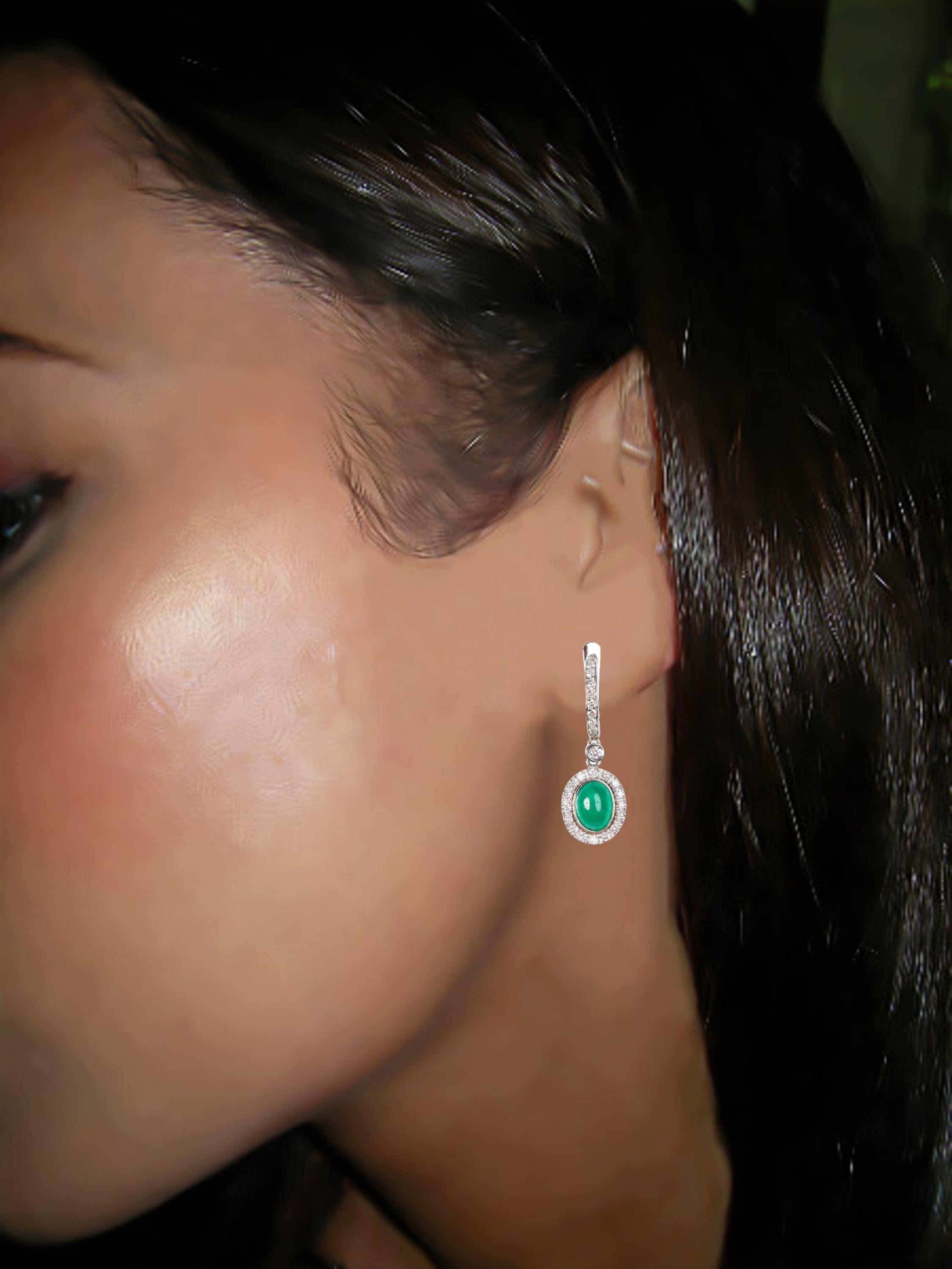 Women's or Men's 18 Karat White Gold Diamond and Emerald Dangle Earrings For Sale