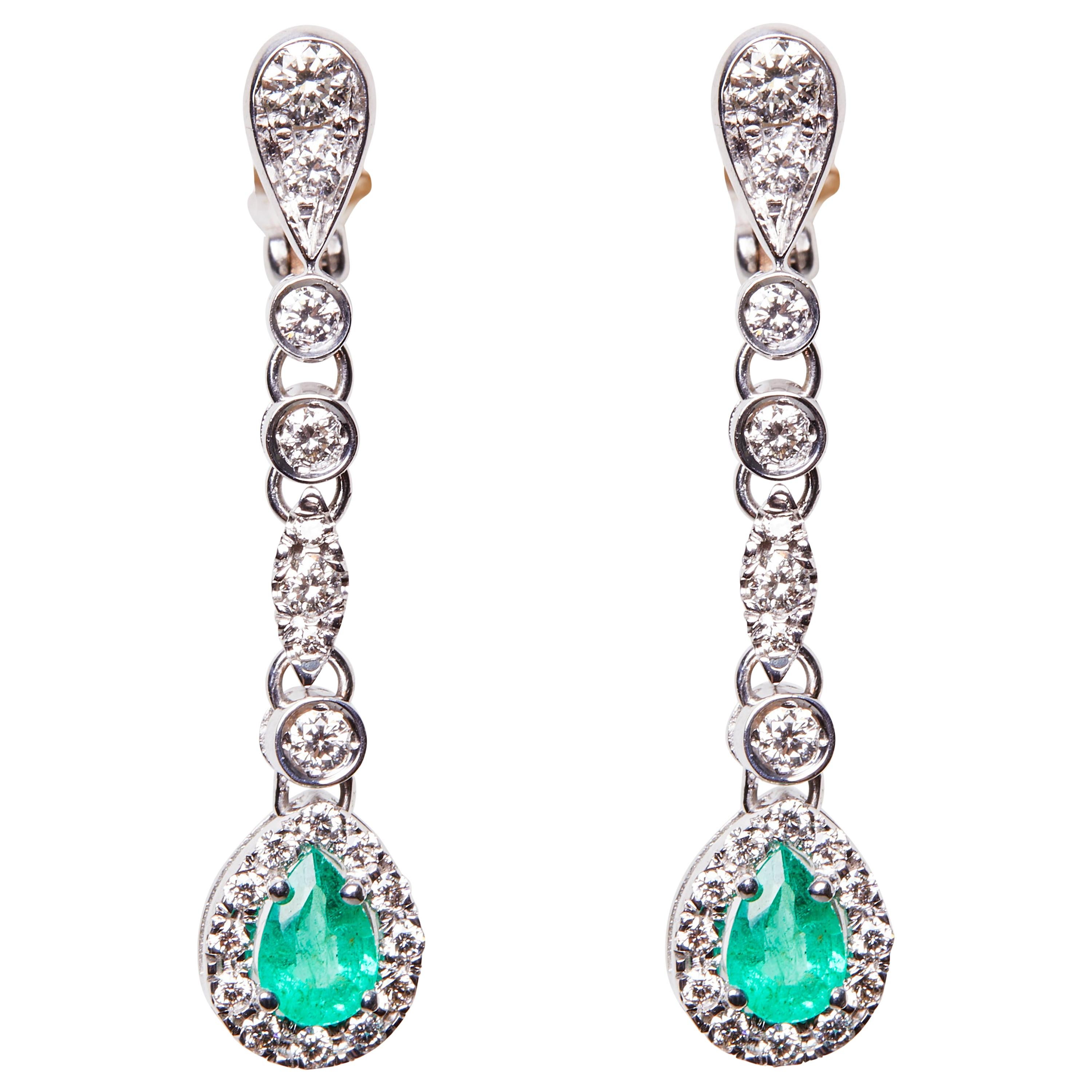 18 Karat White Gold Diamond and Emerald Dangle Earrings For Sale