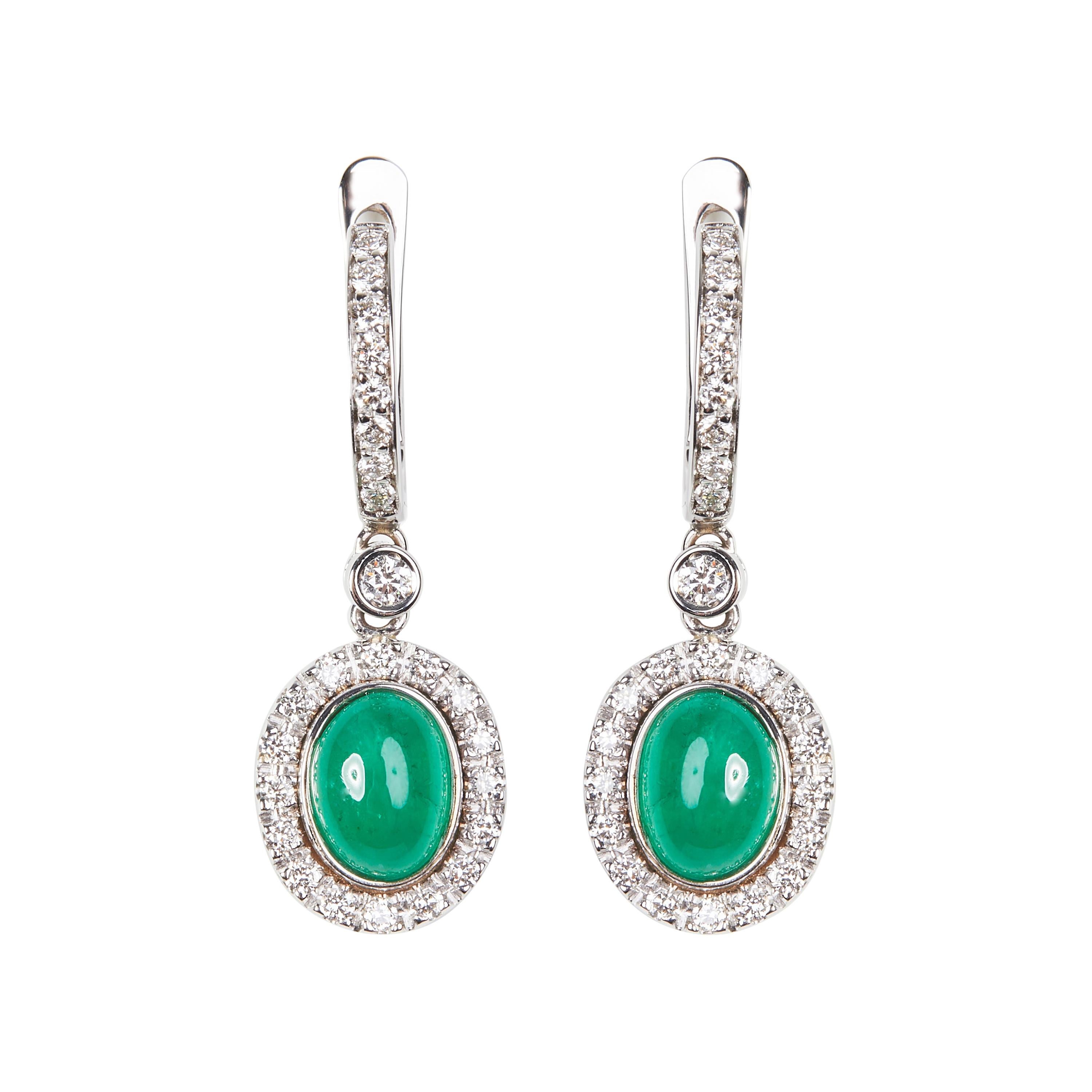 18 Karat White Gold Diamond and Emerald Dangle Earrings For Sale