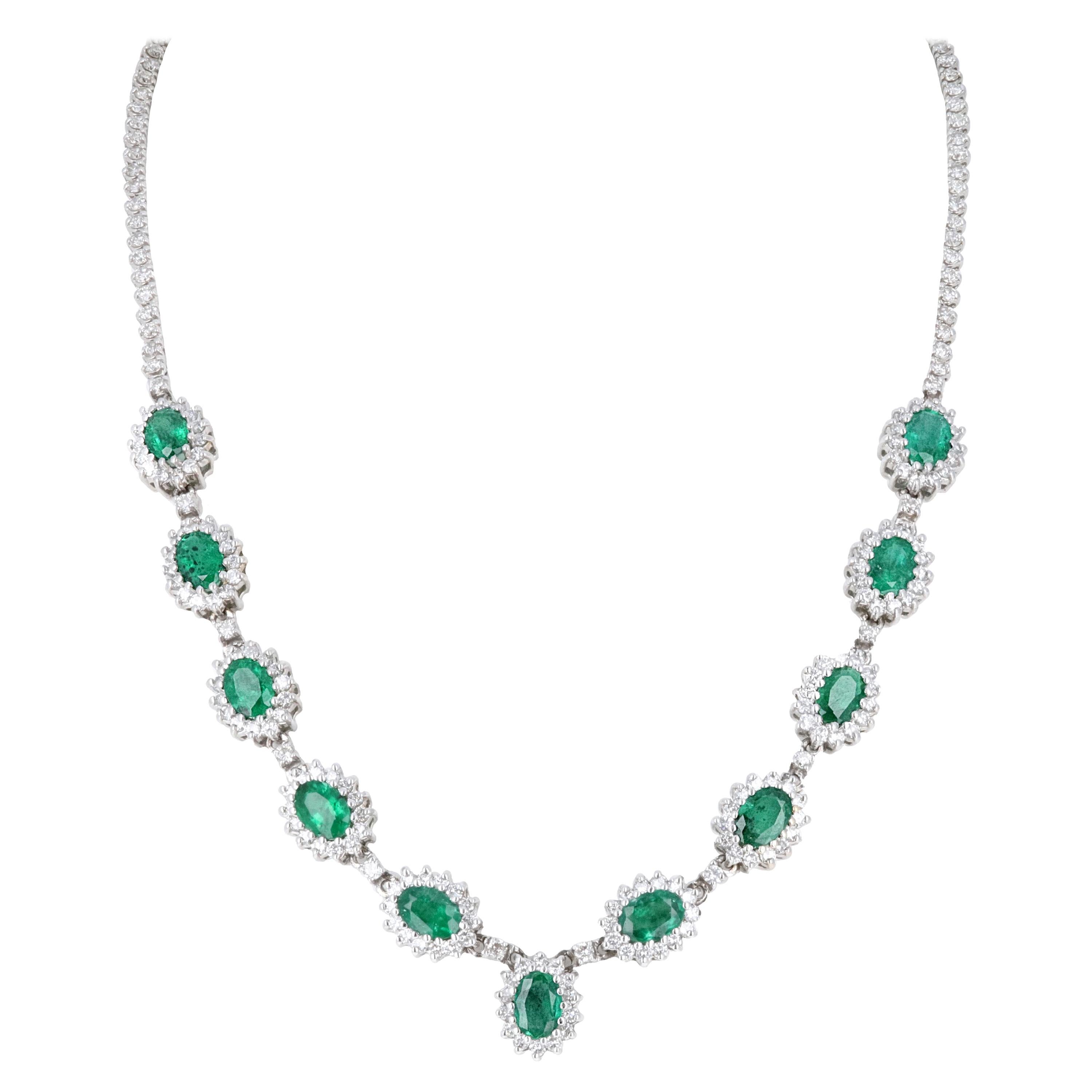 18 Karat White Gold 6.84ct Diamond and 11ct Emerald Drop Necklace. 16 inches