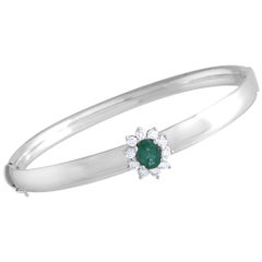 18 Karat White Gold Diamond and Emerald Flower Bangle Bracelet