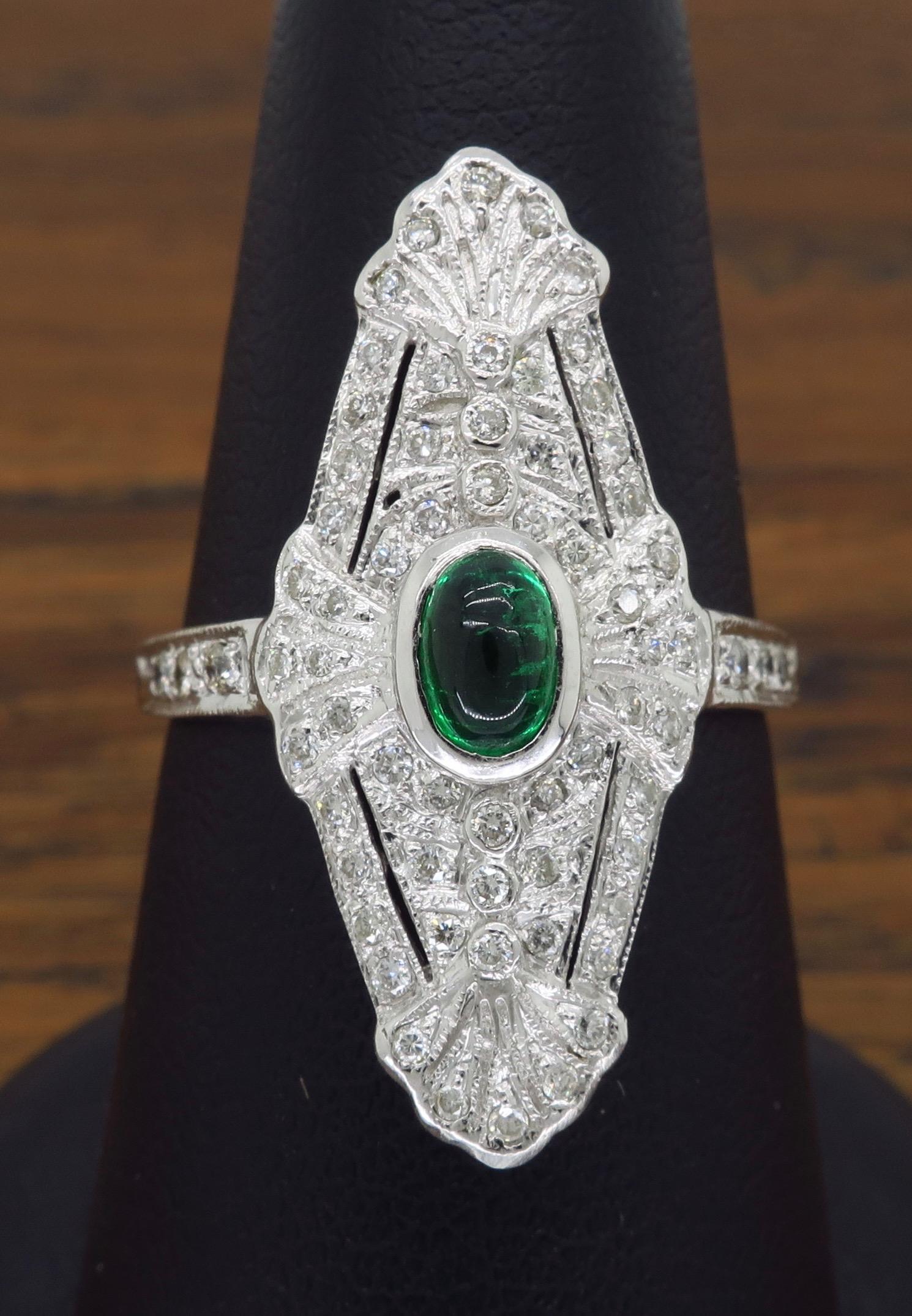 Absolutely stunning vintage navette emerald and diamond ring set in 18k white gold.

 
Gemstone: Emerald & Diamonds
Gemstone Carat Weight: Approximately .50CT
Diamond Carat Weight: Approximately .50CTW 
Diamond Cut: Round Brilliant
Color: Average