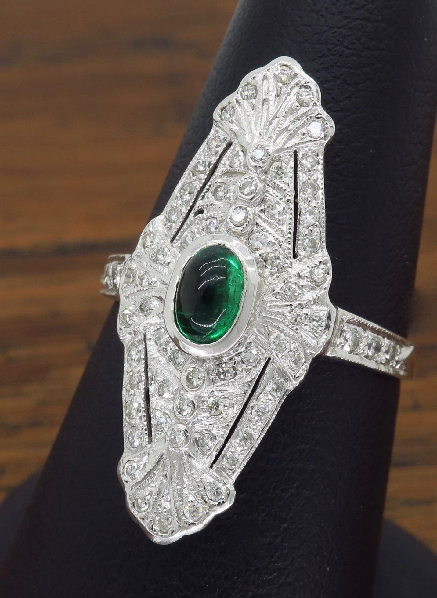 Round Cut 18 Karat White Gold Diamond and Emerald Navette Ring