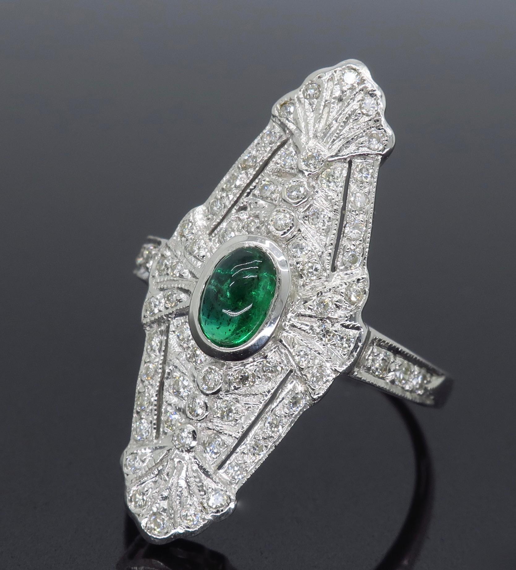 18 Karat White Gold Diamond and Emerald Navette Ring 1