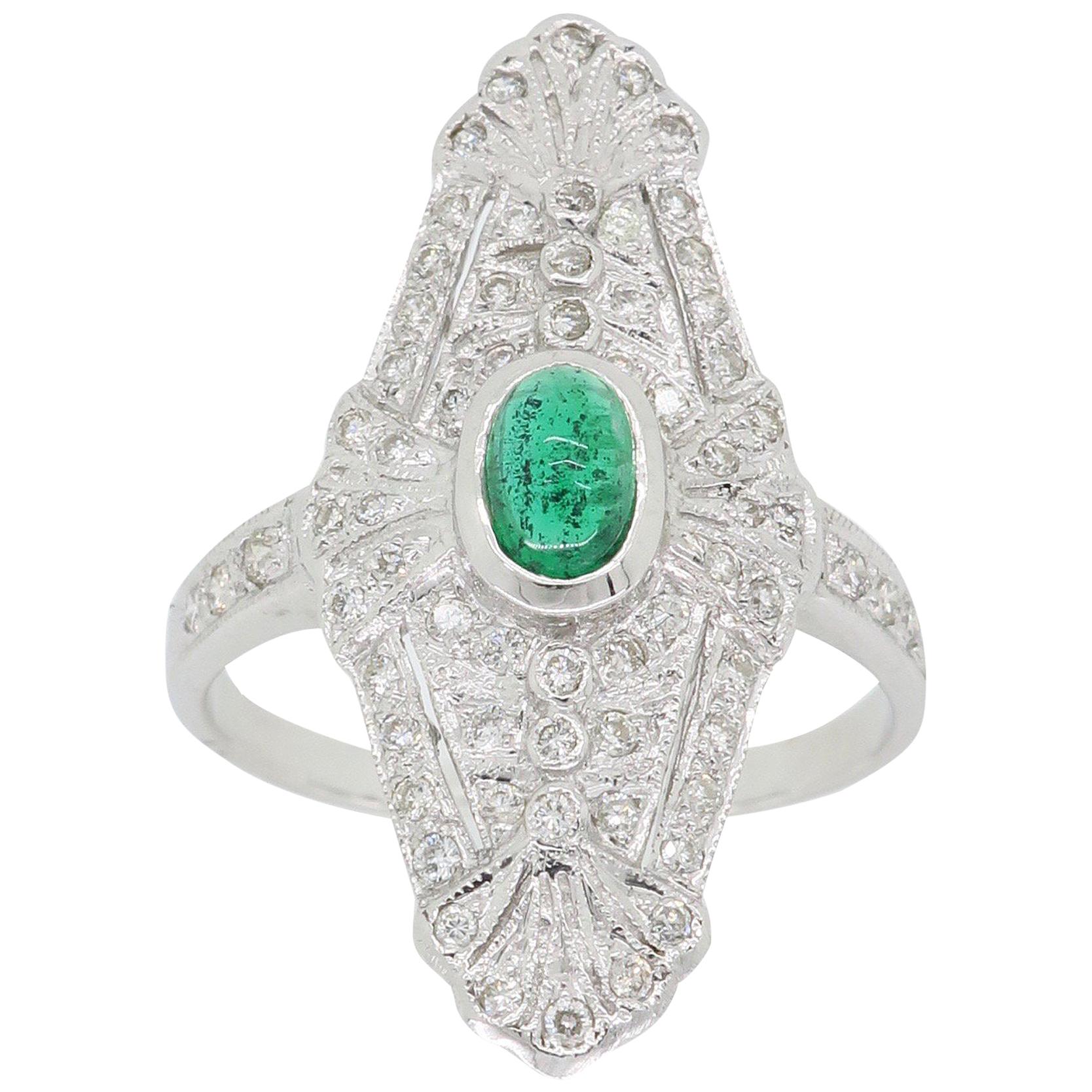 18 Karat White Gold Diamond and Emerald Navette Ring