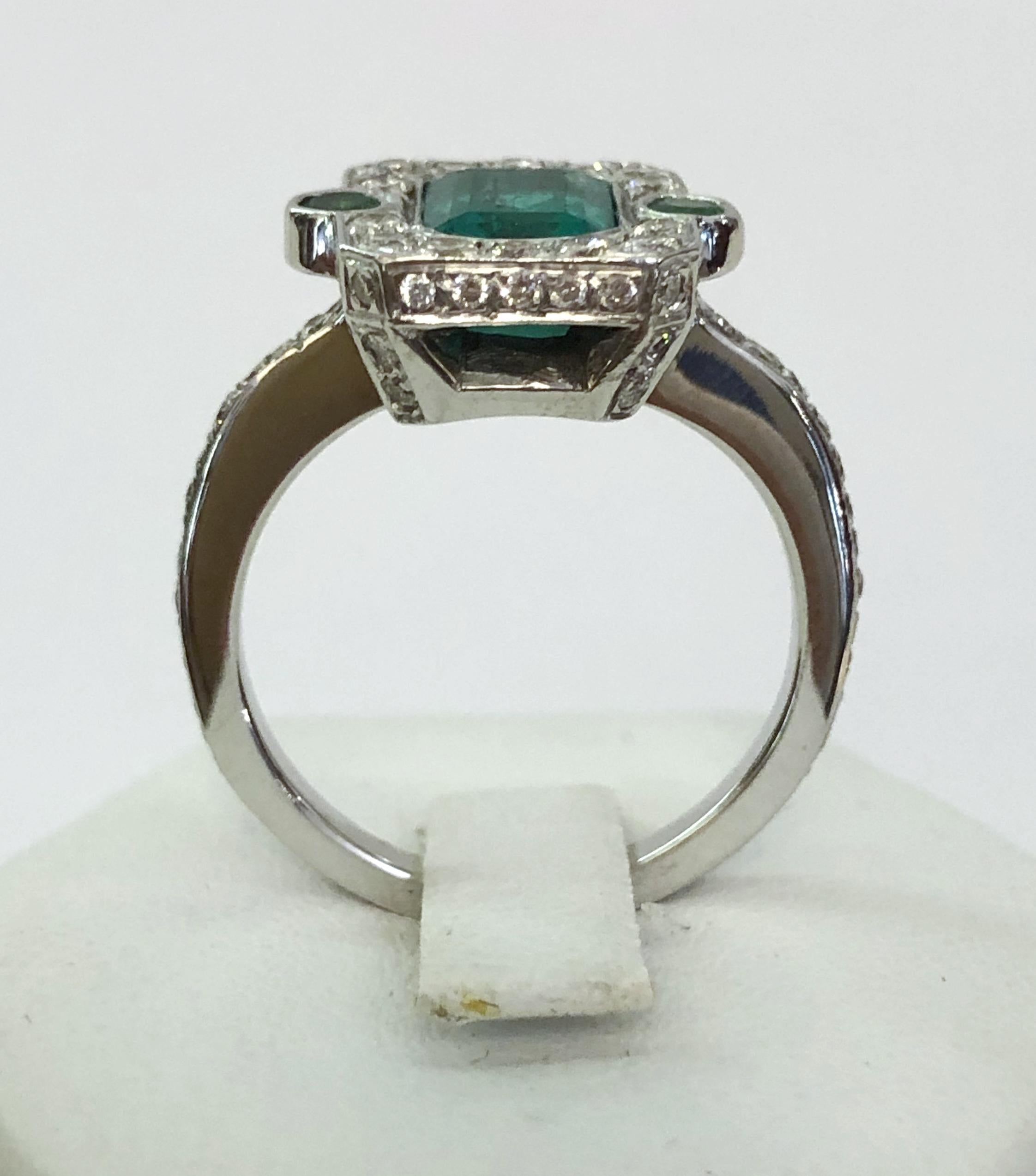 Women's or Men's 18 Karat White Gold Diamond and Emerald Ring For Sale
