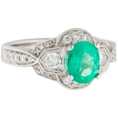 18 Karat White Gold Diamond and Emerald Ring