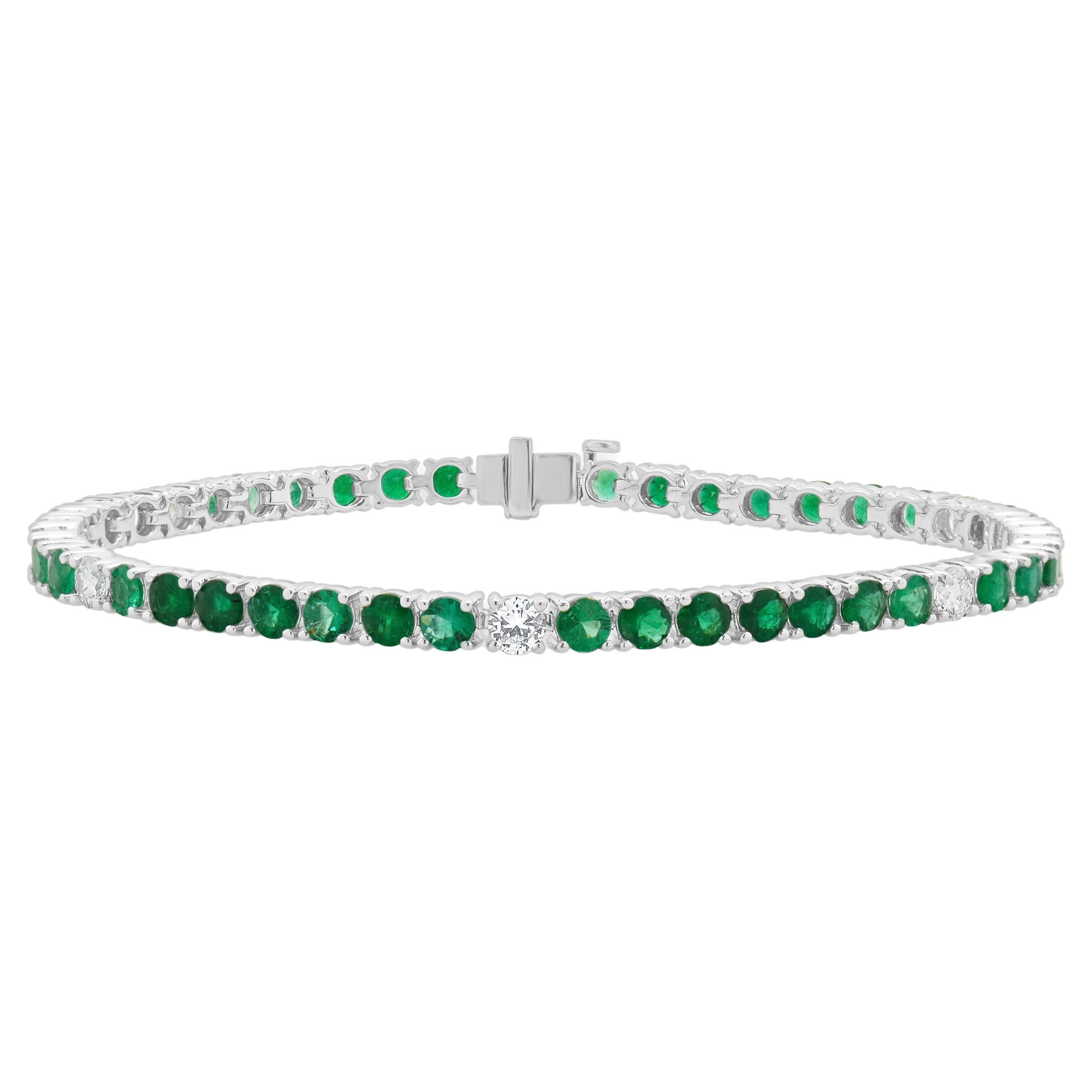 18 Karat White Gold Diamond and Emerald Tennis Bracelet For Sale