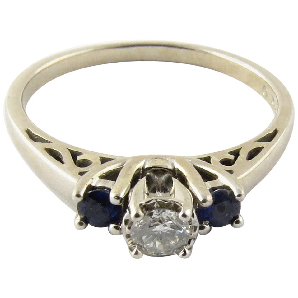 18 Karat White Gold Diamond and Genuine Sapphire Ring