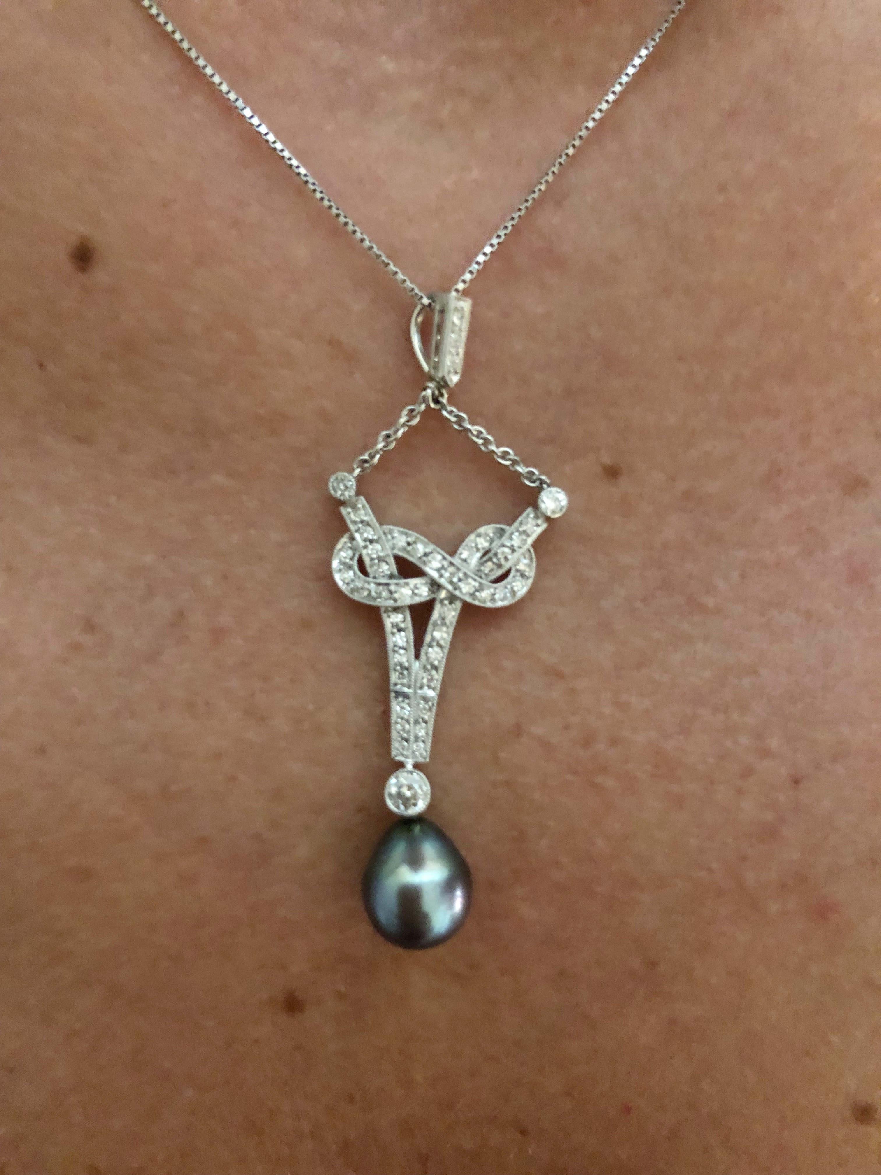 Vintage Italian 18 karat white gold love knot pendant with small diamonds and a gray pearl / Made in Italy 1930s