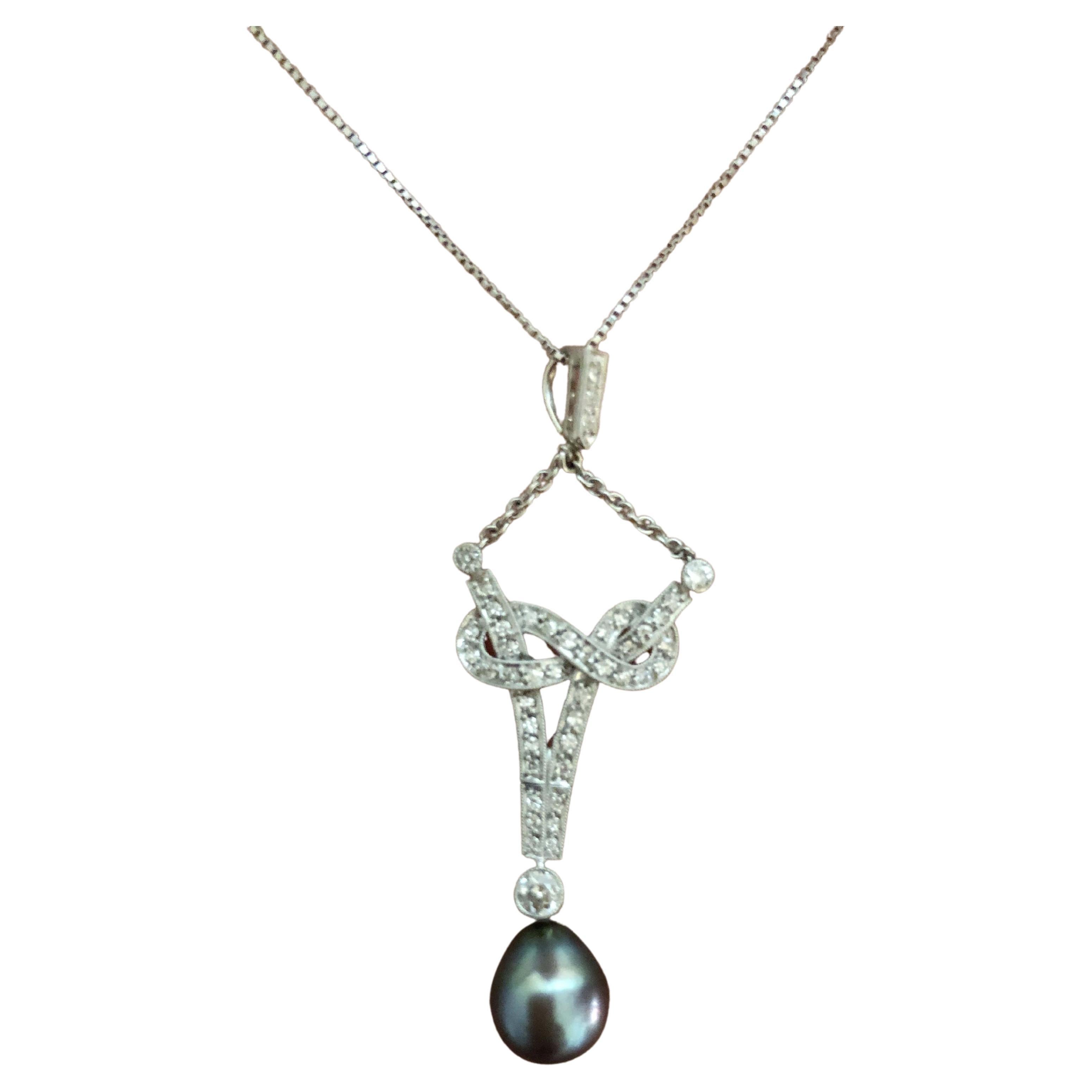 18 Karat White Gold Diamond and Pearl Pendant For Sale