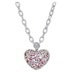 Corazón de diamante y zafiro rosa de oro blanco de 18 quilates en una cadena de eslabones de diamante completo