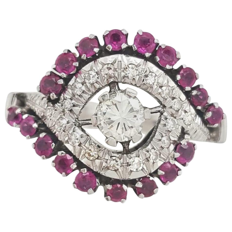 18 Karat White Gold Diamond and Ruby Bypass Ring, Round Brilliant Cut Center