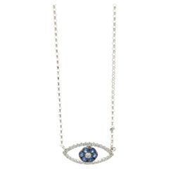 18 Karat White Gold Diamond and Sapphire Evil Eye Necklace