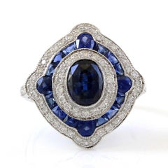 18 Karat White Gold Diamond and Sapphire Halo Estate Ring