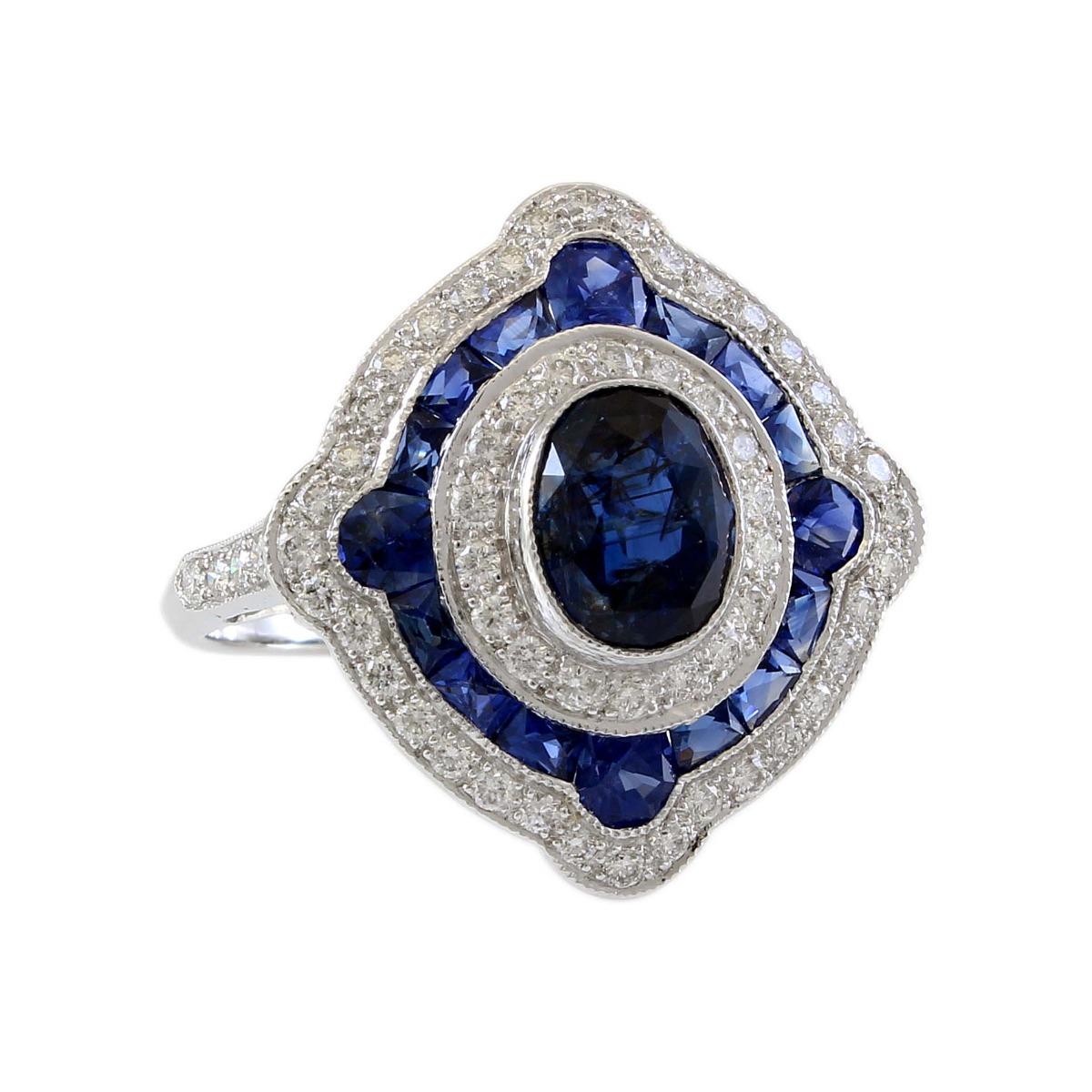 18 Karat White Gold Diamond and Sapphire Halo Estate Ring For Sale