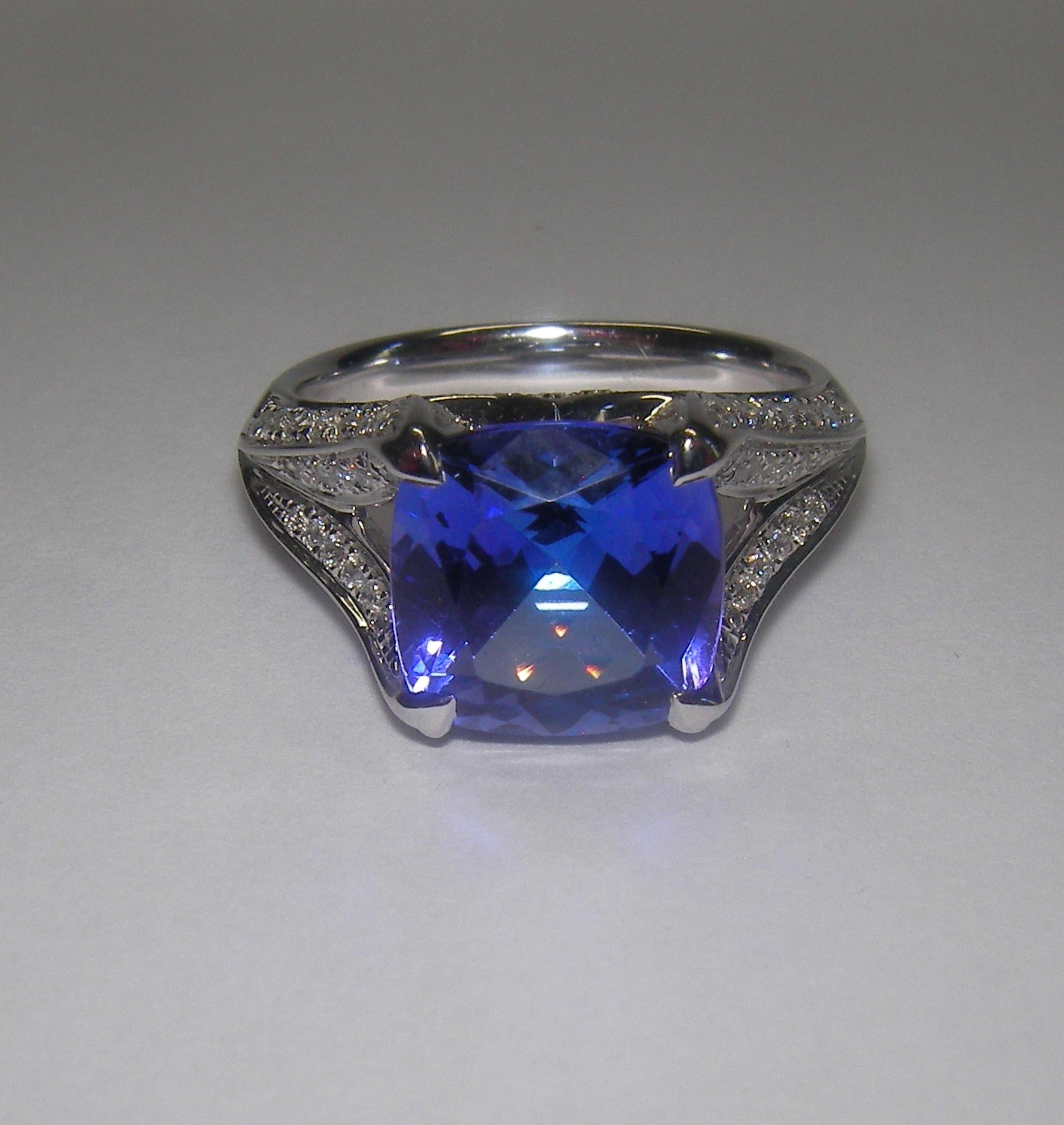 
Beautiful 18 Karat white gold cocktail ring with a stunning 3.5 carat tanzanite center stone. This ring combines classical with modern elements and can be worn every day! 

82 Diamonds 0.65 carat
1 Tansanite 3.50 carat

Size EU 53.5 US