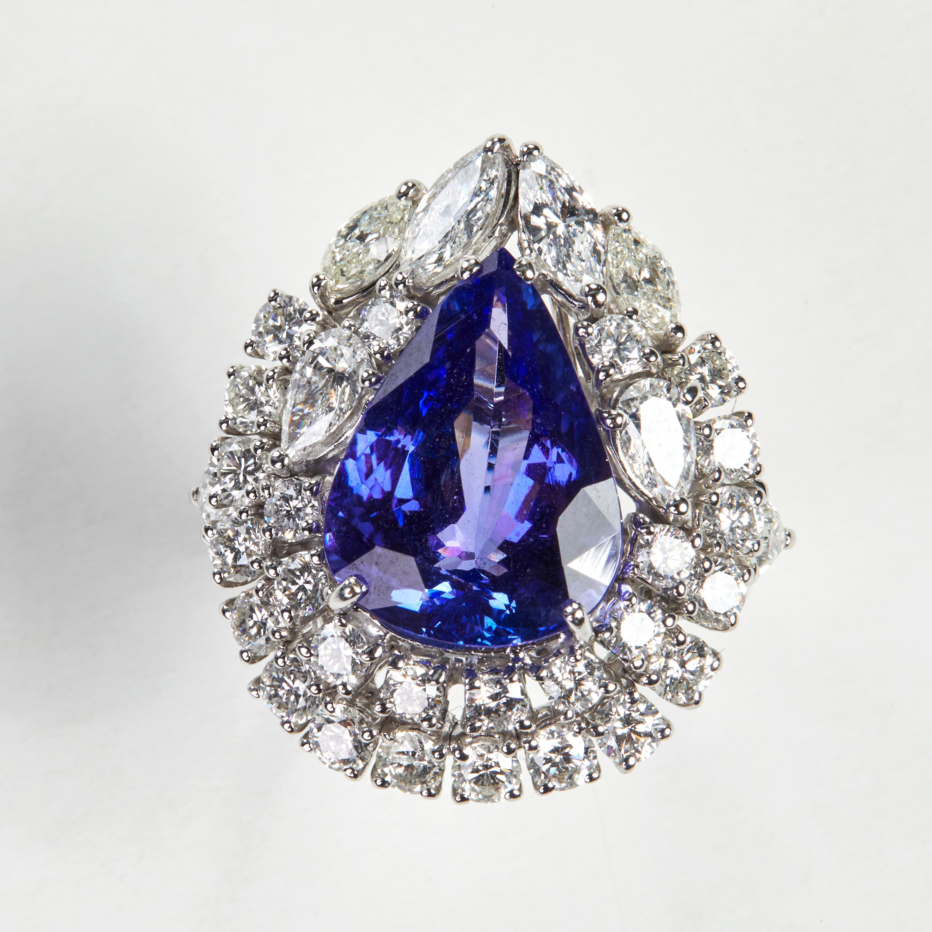 
Beautiful 18 Karat white gold cocktail ring with a stunning 6.50 carat tanzanite center stone. This ring combines classical with modern elements and can be worn every day! 

34  Diamonds 2.92 carat

1 Tansanite Pear. 6.50 carat

Size EU 53.5 US