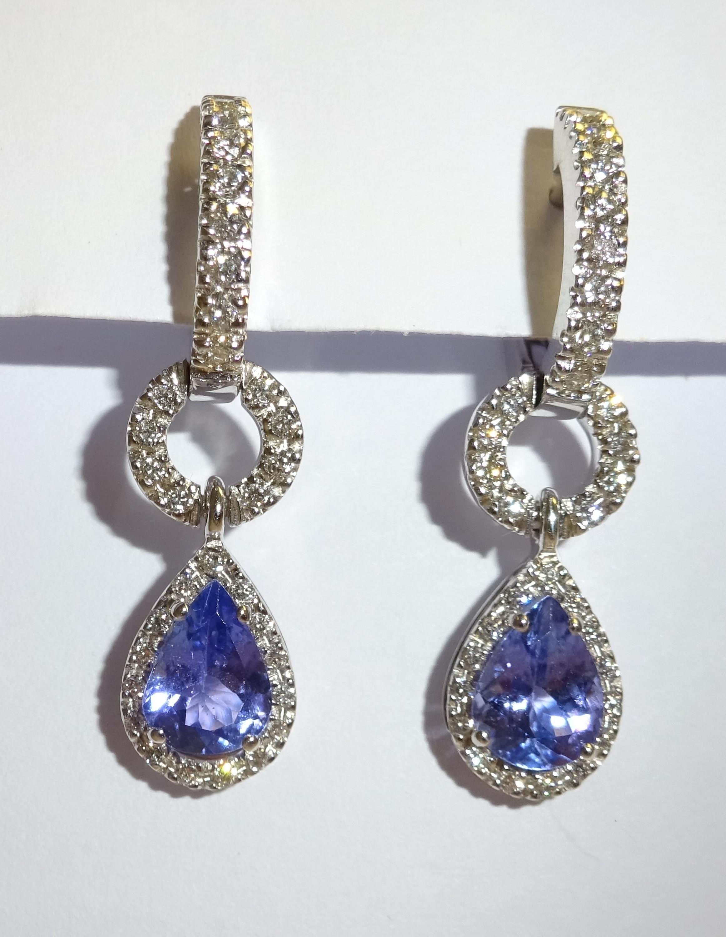 18 Karat White Gold Diamond and Tanzanite Dangle Earrings

62 Diamonds 0.60  Carat H SI
2 Tanzanite 2.03  Carat


Founded in 1974, Gianni Lazzaro is a family-owned jewelry company based out of Düsseldorf, Germany.
Although rooted in Germany, Gianni