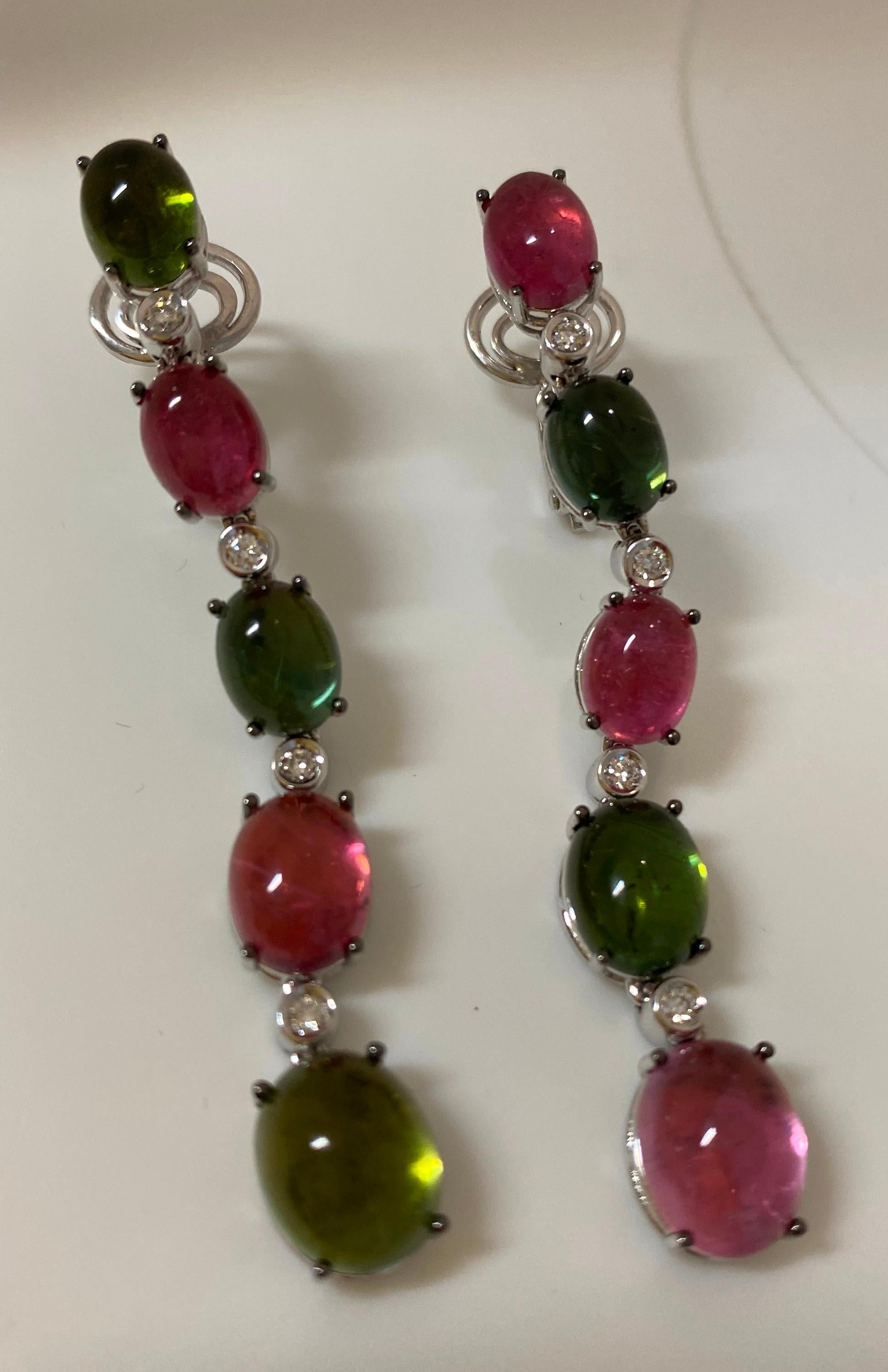 18 Karat White Gold Diamond  and Tourmaline  Dangle Earrings

8 Diamonds 0,19 Carat
5  Tourmaline  rose 9,47 Carat
5 Tourmaline green 10,28 Carat





Founded in 1974, Gianni Lazzaro is a family-owned jewelery company based out of Düsseldorf,