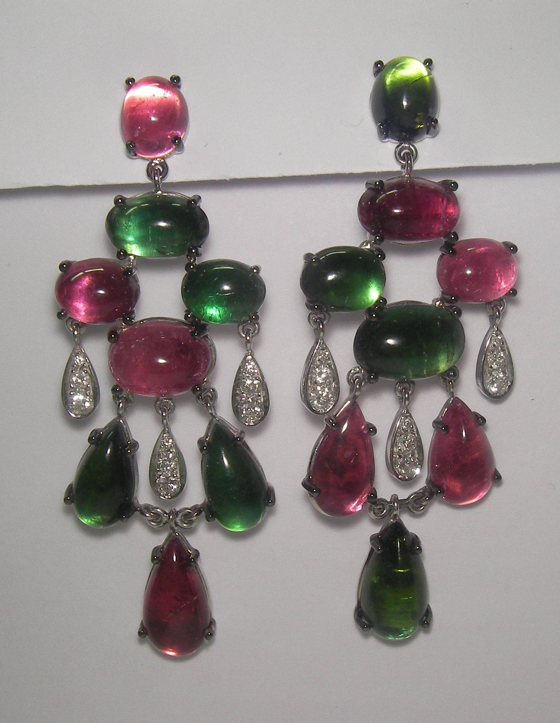 18 Karat White Gold Diamond  and Tourmaline  Dangle Earrings

18 Diamonds 0,71 Carat
16 Tourmaline  rose and green 49,45 Carat






Founded in 1974, Gianni Lazzaro is a family-owned jewelery company based out of Düsseldorf, Germany.
Although rooted