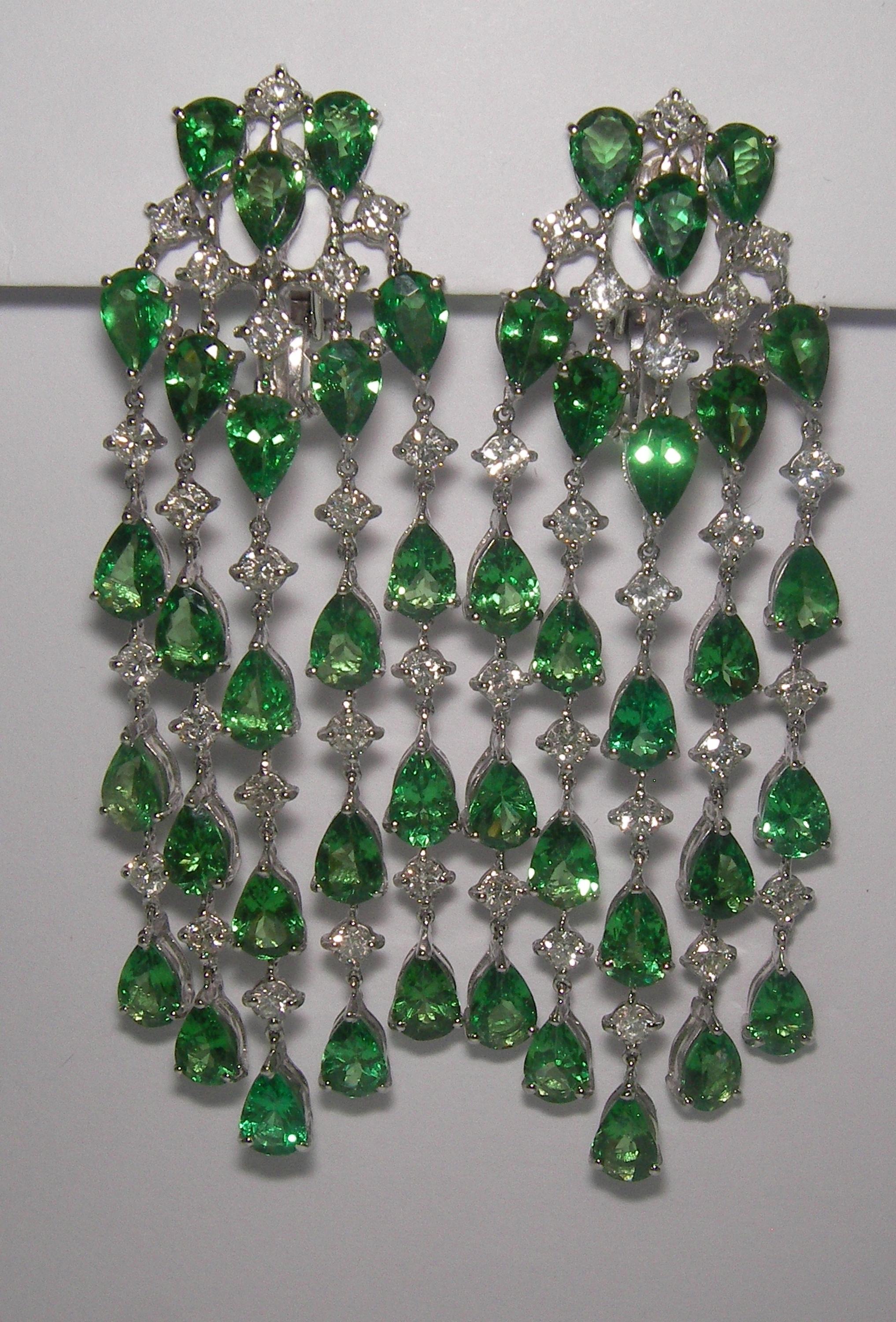 18 Karat White Gold Diamond and Tsavotite Dangle Earrings

42 Diamonds 2,79 Carat H SI
42 Tsavorite 18.30 Carat


Founded in 1974, Gianni Lazzaro is a family-owned jewelry company based out of Düsseldorf, Germany.
Although rooted in Germany, Gianni