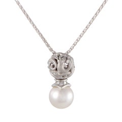 18 Karat White Gold Diamond and White Pearl Dolphin Pendant Necklace