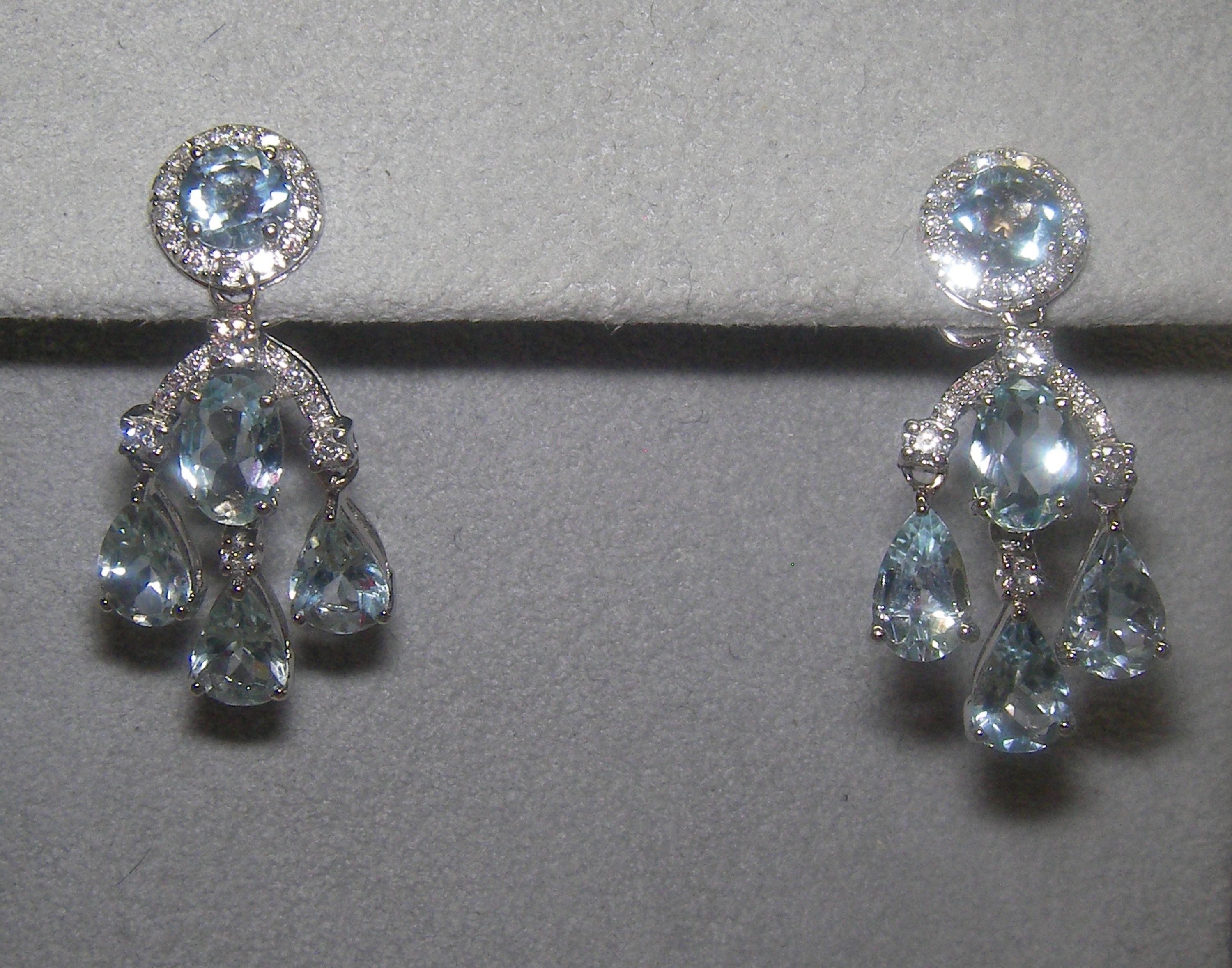  18 Karat White Gold Diamond, Aquamarine Dangle Earrings

48  Diamonds 0.33 Carat H SI
10 Aquamarine  3.29 Carat


Founded in 1974, Gianni Lazzaro is a family-owned jewelry company based out of Düsseldorf, Germany.
Although rooted in Germany, Gianni