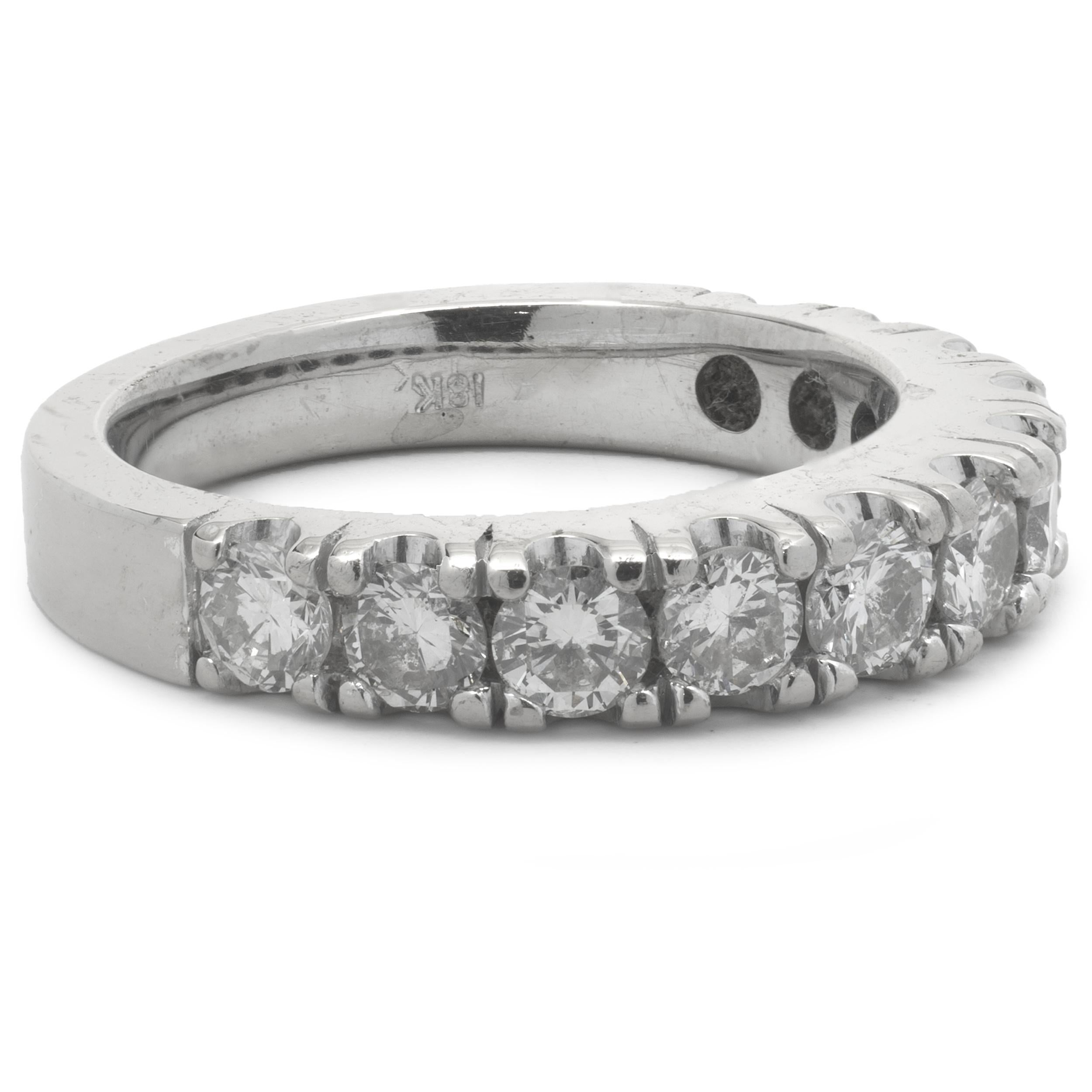 Designer: Custom
Material: 18K white gold
Diamonds: 11 round brilliant cut = 1.00cttw
Color: H/I
Clarity: VS2
Size: 5.25 complimentary sizing available
Dimensions: ring measures 4mm in width
Weight: 6.43 grams

