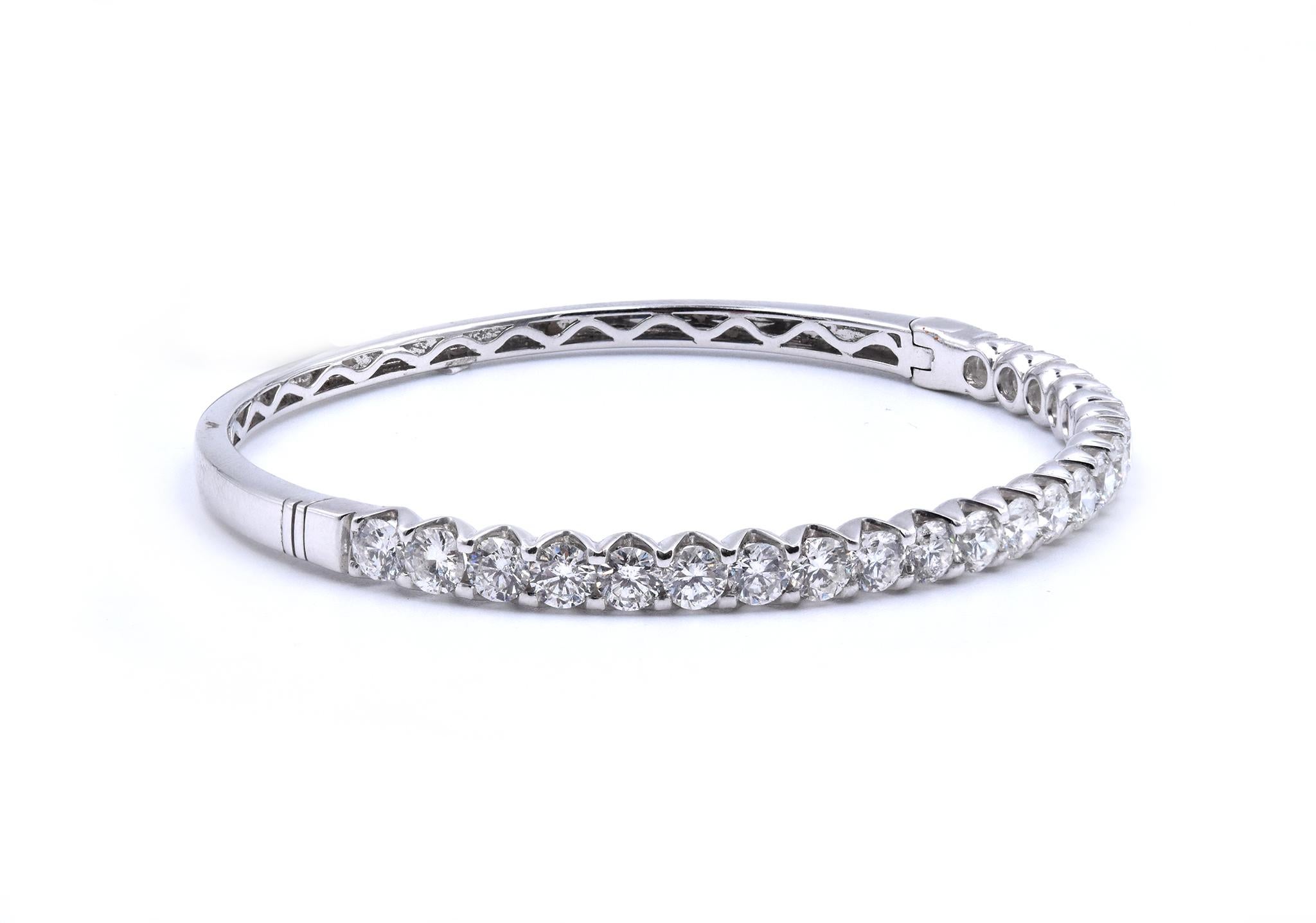 Material: 18K white gold
Diamonds: 21 round brilliant cut = 5.00cttw
Color: G
Clarity: VS2
Dimensions: bracelet will fit up to a 6.5-inch wrist
Weight: 14.84 grams
