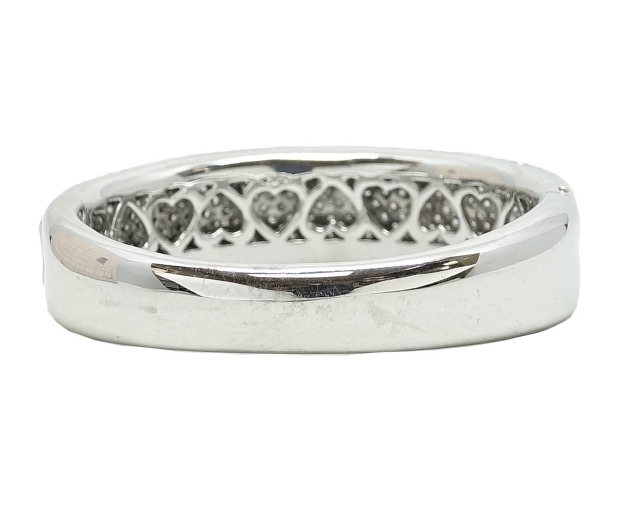 This 18K White Gold Bangle Is Covered In Diamonds And Sure To Make A Statement. These Diamonds Weigh A Total Carat Weight Of 10.58 Carats. This Lovelt Bangle Is 7.5 Inches Around. 
