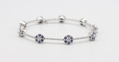 18 Karat White Gold Natural Diamond & Blue Sapphire Flower Station Bracelet