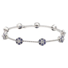 18 Karat White Gold Natural Diamond & Blue Sapphire Flower Station Bracelet