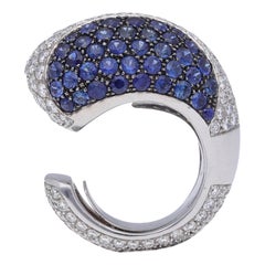 Bague cocktail en or blanc 18 carats avec diamants et saphirs bleus