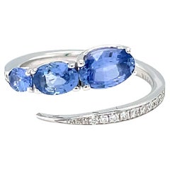 18 Karat White Gold Diamond Blue Sapphires Swirl Ring