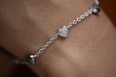 18 Karat White Gold Diamond Charm Bracelet