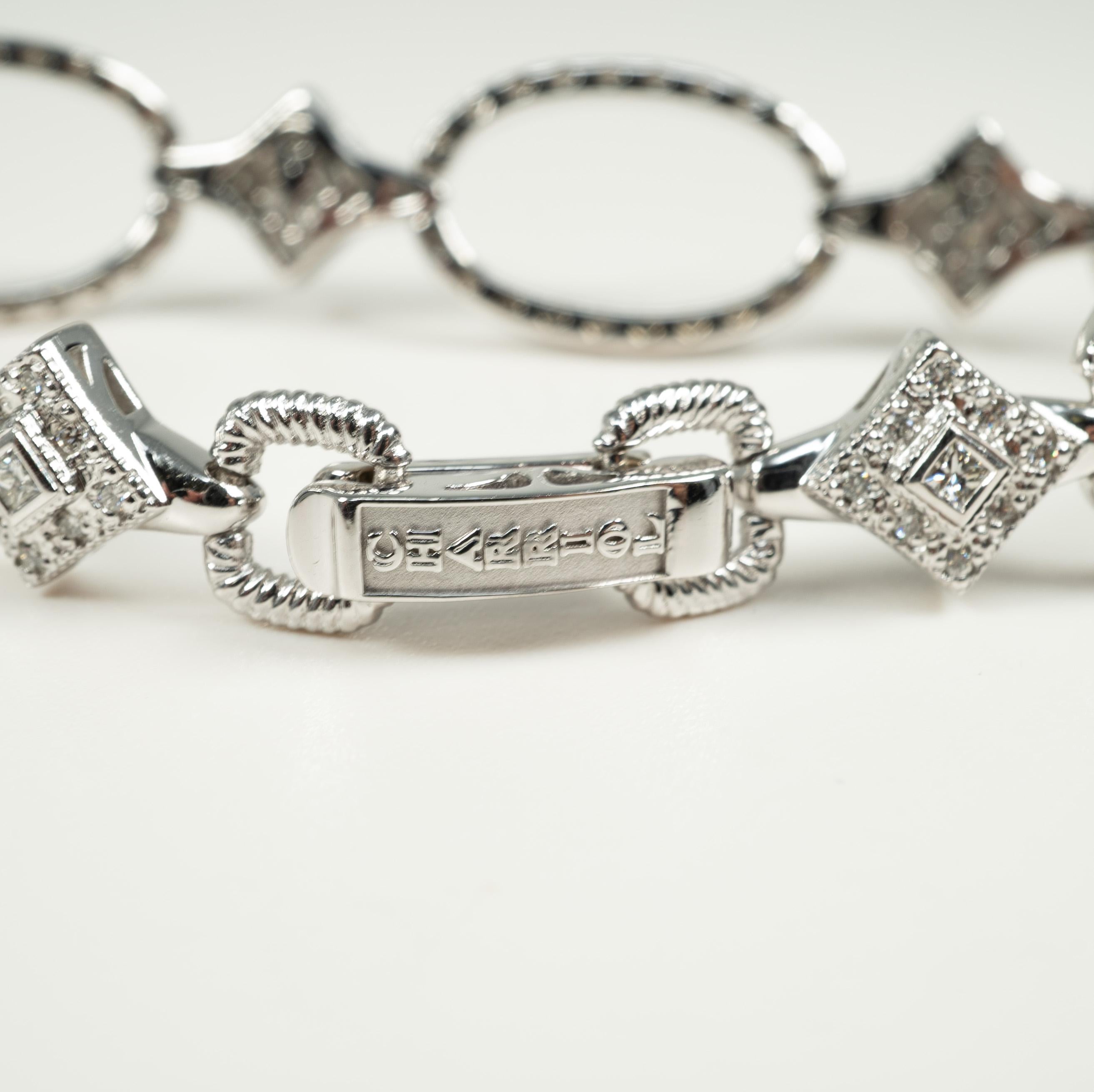 This stunning 18 karat white gold bracelet by Charriol supports 1.30 carats of lovely diamonds!