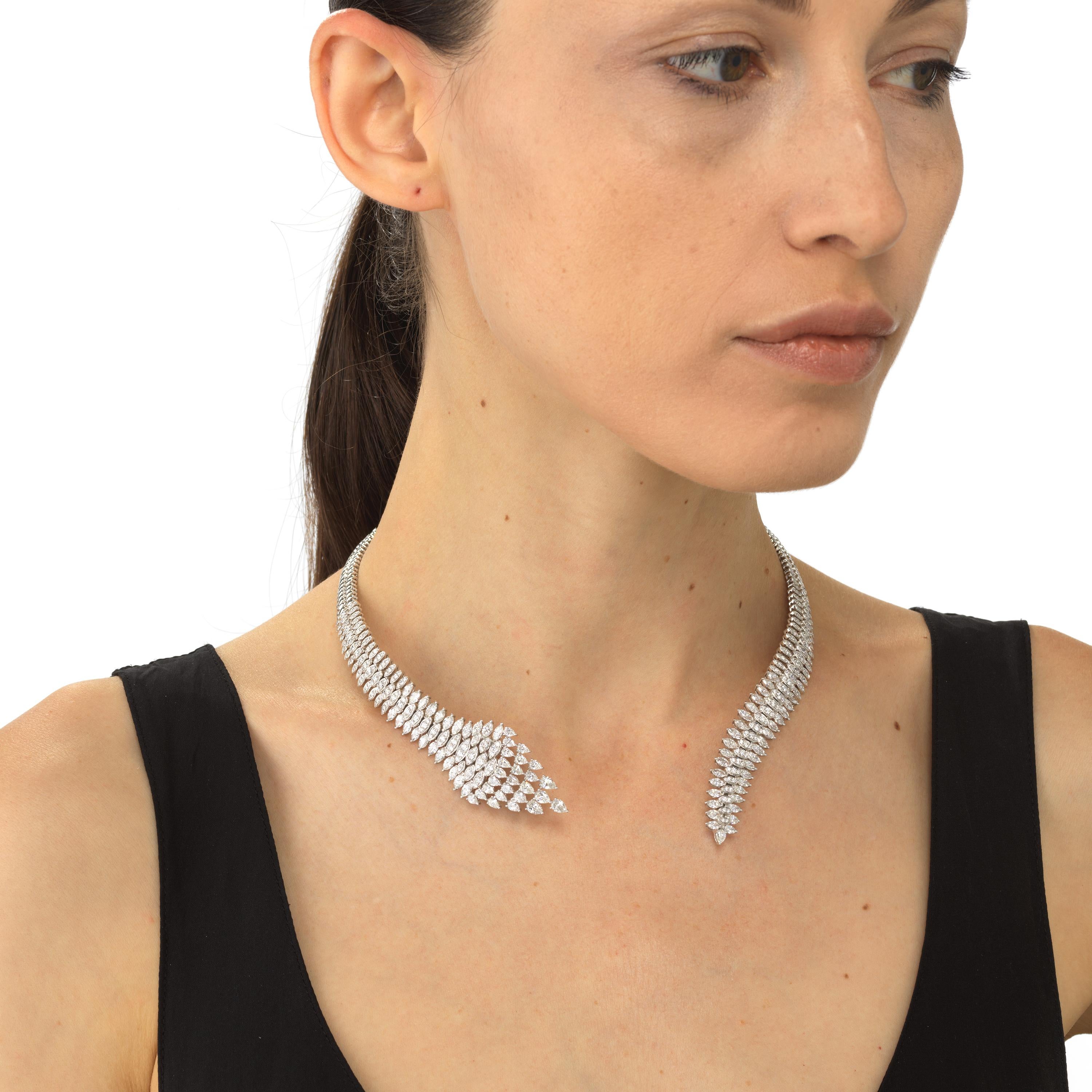 This choker necklace in 18K white gold will add a little bit of edge and uniqueness to your look. Each choker is made with almost 12Cts of pear and round cut diamonds.
