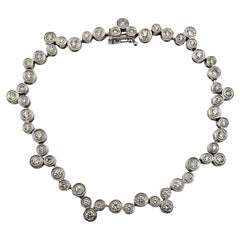 18 Karat White Gold Diamond Circle Design Tennis Bracelet #21794
