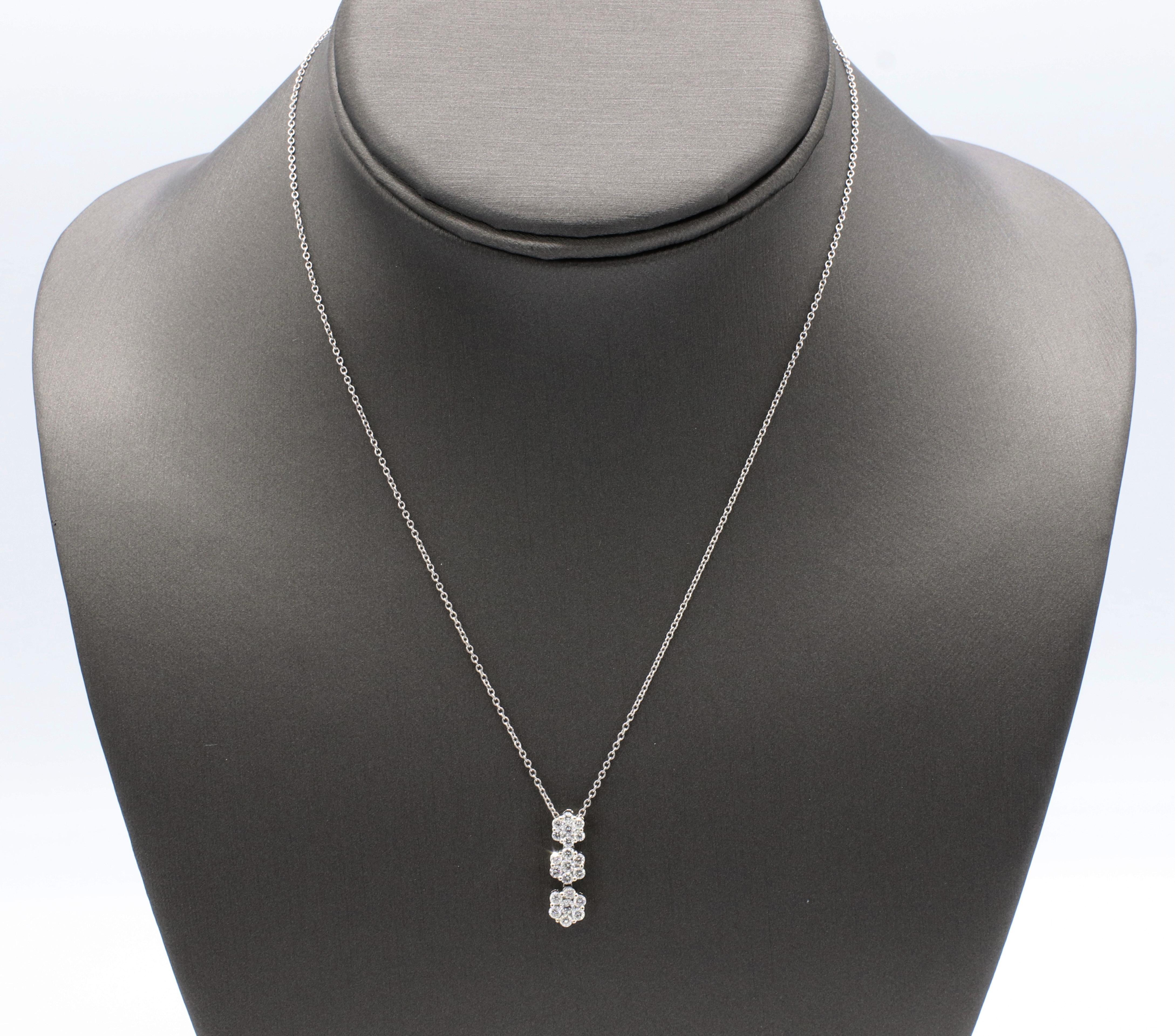 18 Karat White Gold .65 CTW Diamond Cluster Drop Pendant Necklace 16 inches 
Metal: 18k white gold, chain is 14k 
Weight: 2.71 grams 
Diamonds: Approx. .65 CTW G VS-SI 
Chain length: 16 inches 
Pendant length: 17.5MM
