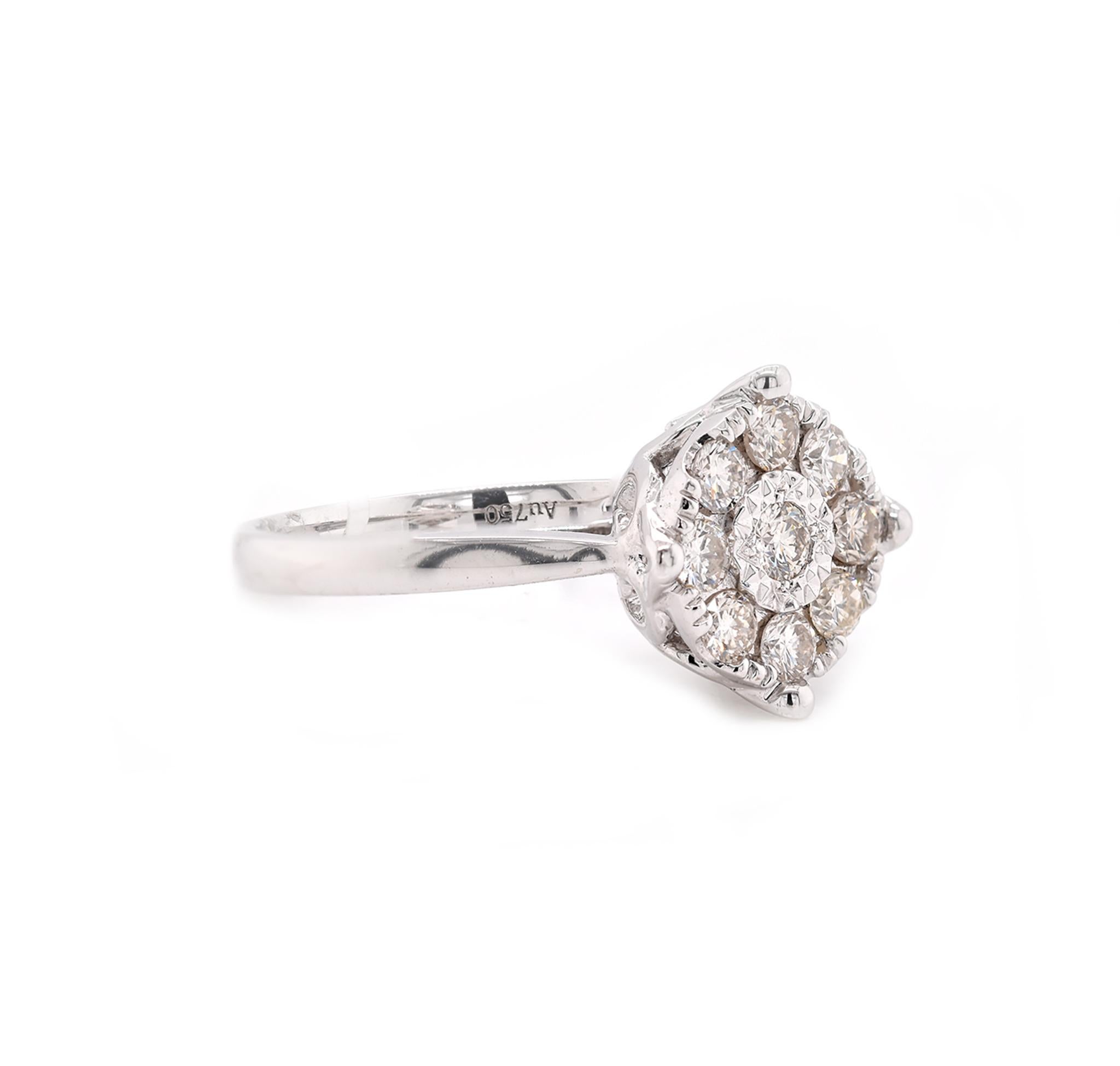 Designer: Custom
Material: 18k white gold
Diamonds: 9 round cut = .63cttw
Color: G
Clarity: VS
Size: 7
Dimensions: ring measures 12.25mm wide
Weight: 4.28 grams
