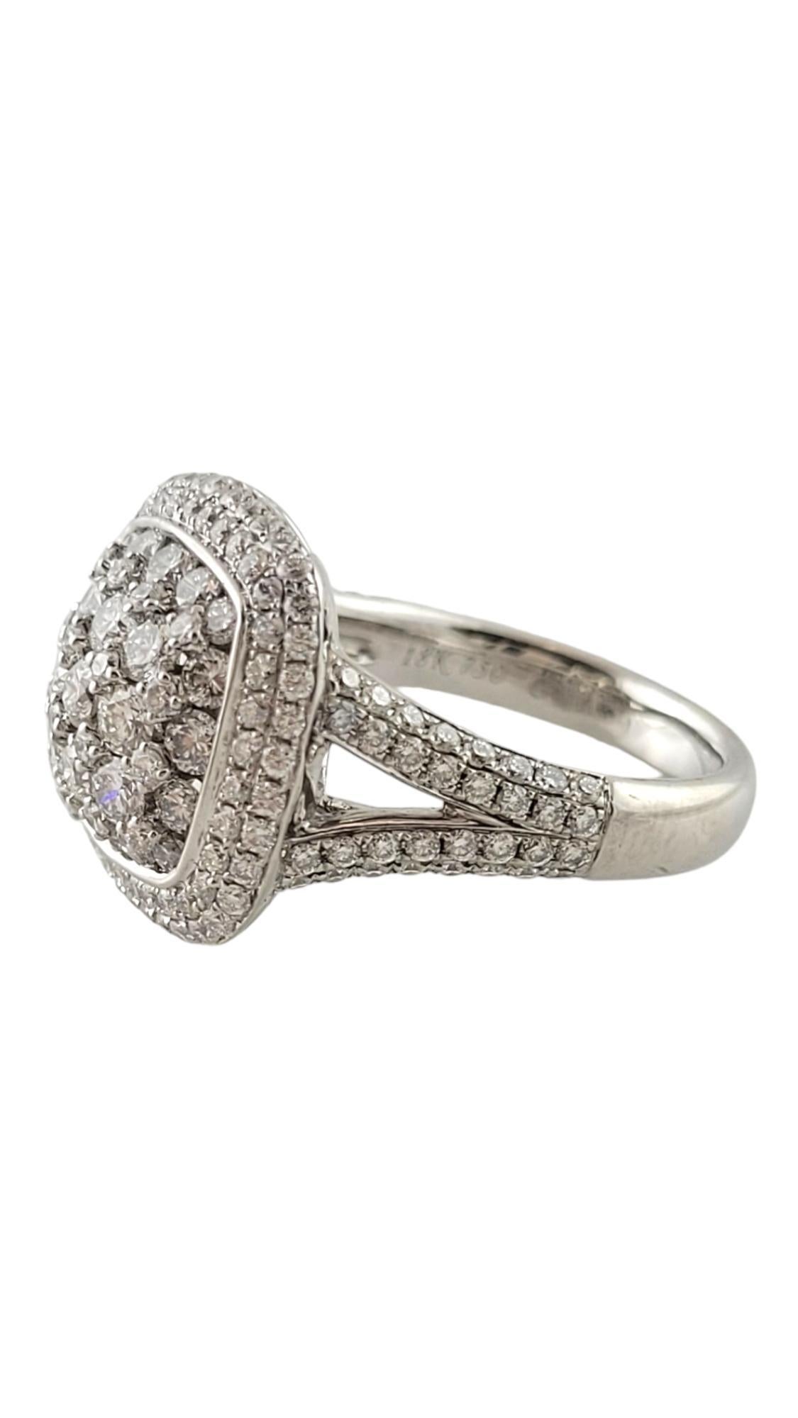 This sparkling ring features 177 round brilliant cut diamonds set in classic 18K white gold.  

Width:  16 mm.  Shank:  3 mm.

Total diamond weight:  2.21 ct.

Diamond clarity: VS2-SI1

Diamond color:  G-H

Ring Size: 6.25

Weight:  6.4 dwt. /  10.0