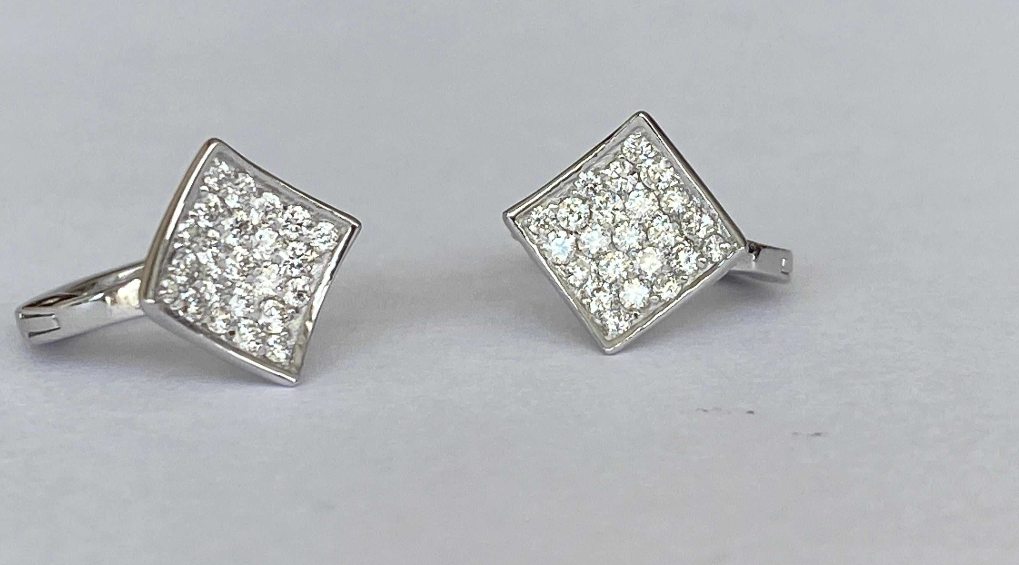 Offered new, design 18 kt creoles on the front set with 46 brilliant cut diamonds of 0,40 ct of quality F/VS
Gold content: 18 kt (hallmarked)  
Size: 10mm*10mm*13mm 
Weight: 2,4 grams
Working for couple of years for one of the famous diamond