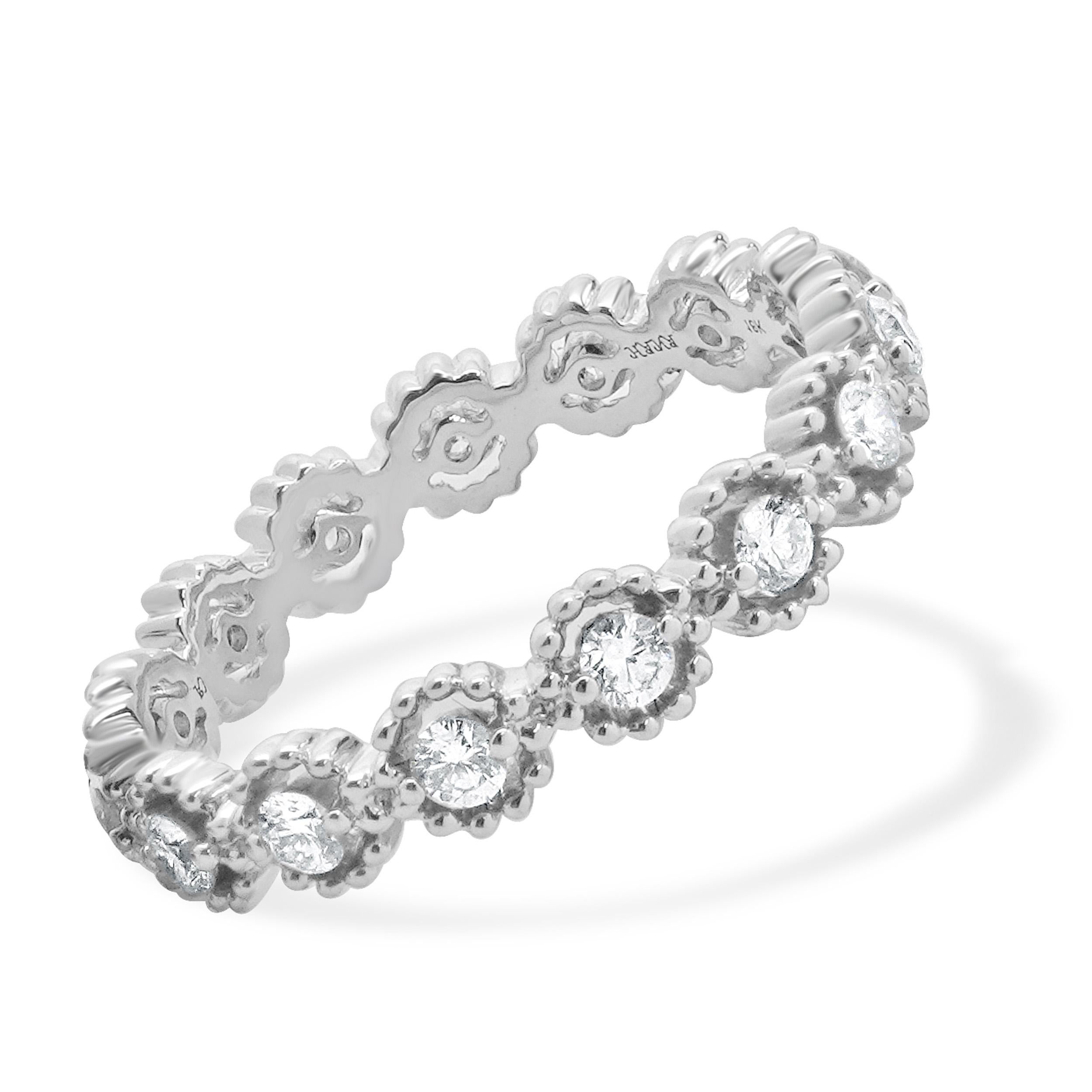 Designer: custom
Material: 18K white gold
Diamond: 15 round brilliant cut = 0.51cttw
Color: G
Clarity: SI1
Ring size: 6.5 (please allow two additional shipping days for sizing requests)
Weight: 2.61 grams
